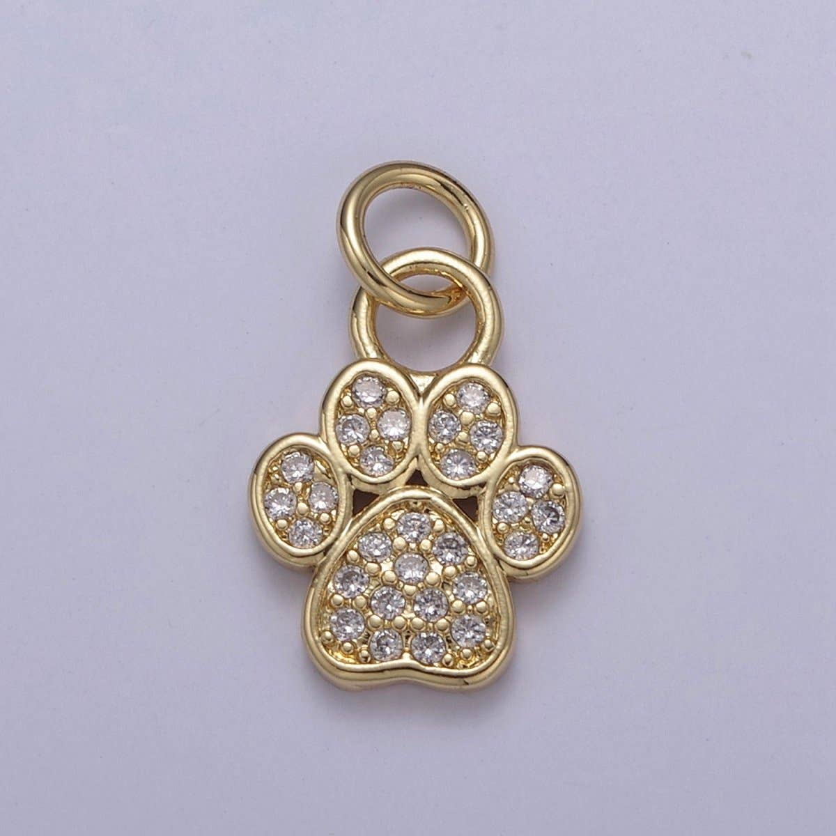 Shop Paw Print Charm-Gold at Ruby Joy Boutique, a Women's Clothing Store in Pickerington, Ohio
