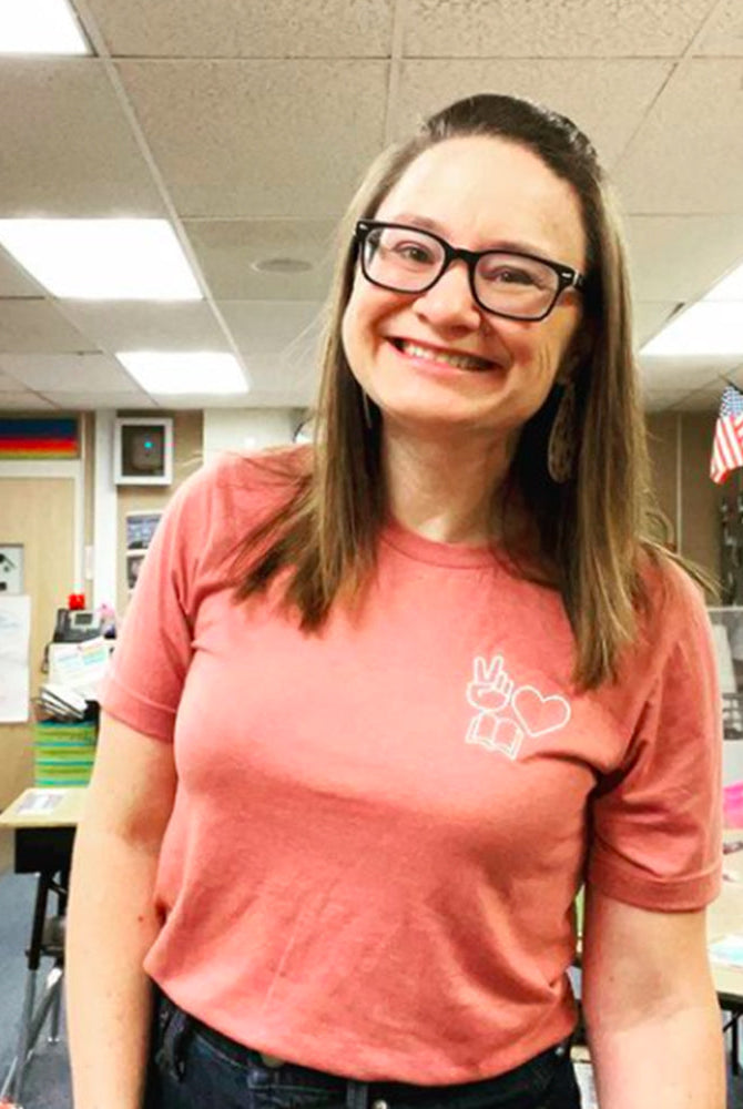 Shop Peace, Love, Books Classic Tee | Kind Cotton- at Ruby Joy Boutique, a Women's Clothing Store in Pickerington, Ohio