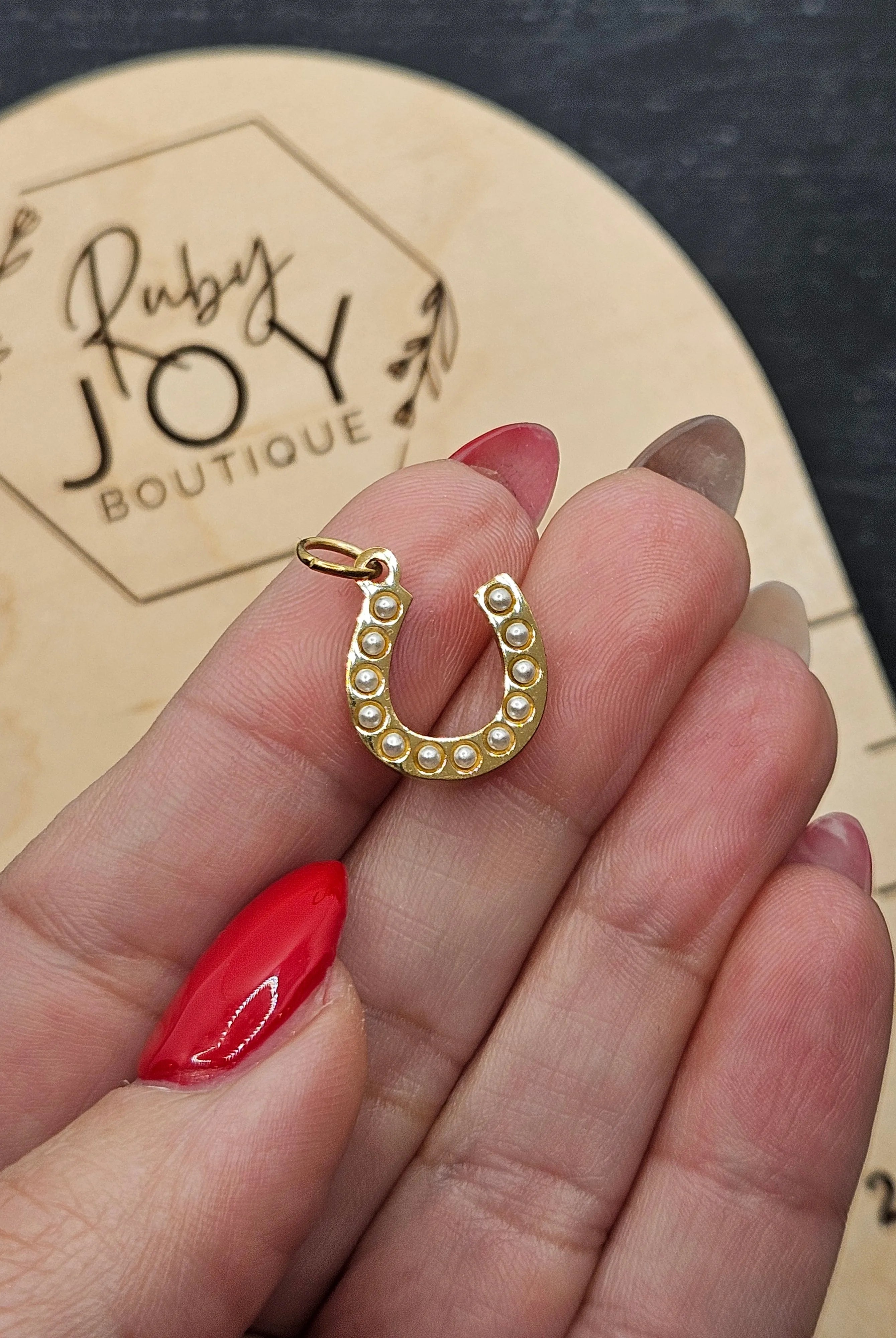 Shop Pearl Horseshoe Charm- at Ruby Joy Boutique, a Women's Clothing Store in Pickerington, Ohio