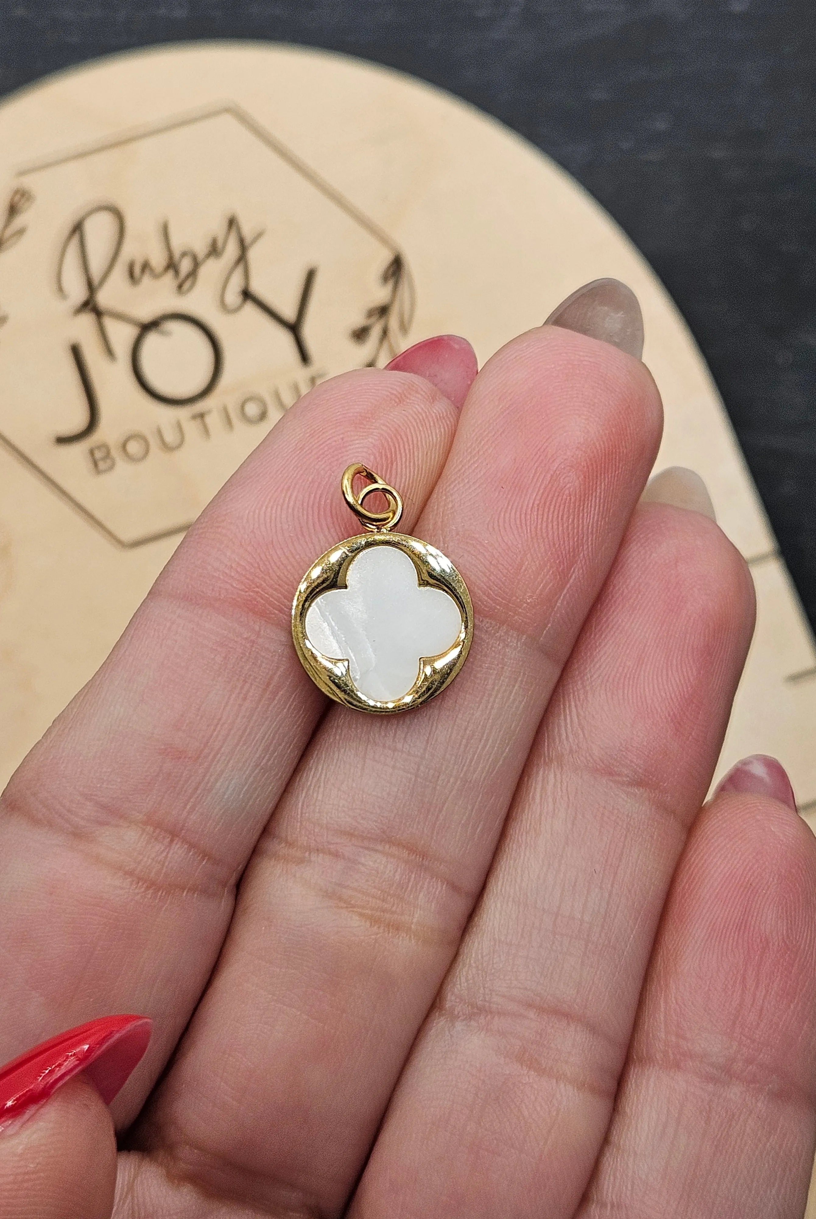 Shop Pearl Quatrefoil Charm- at Ruby Joy Boutique, a Women's Clothing Store in Pickerington, Ohio