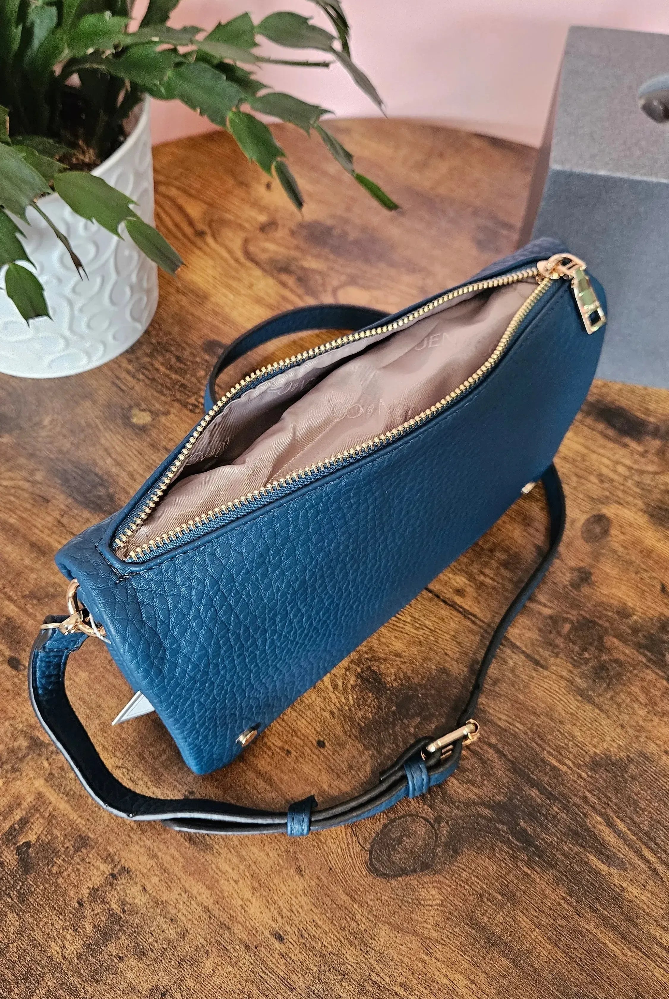 Shop Phiona Studded Crossbody | Peacock- at Ruby Joy Boutique, a Women's Clothing Store in Pickerington, Ohio