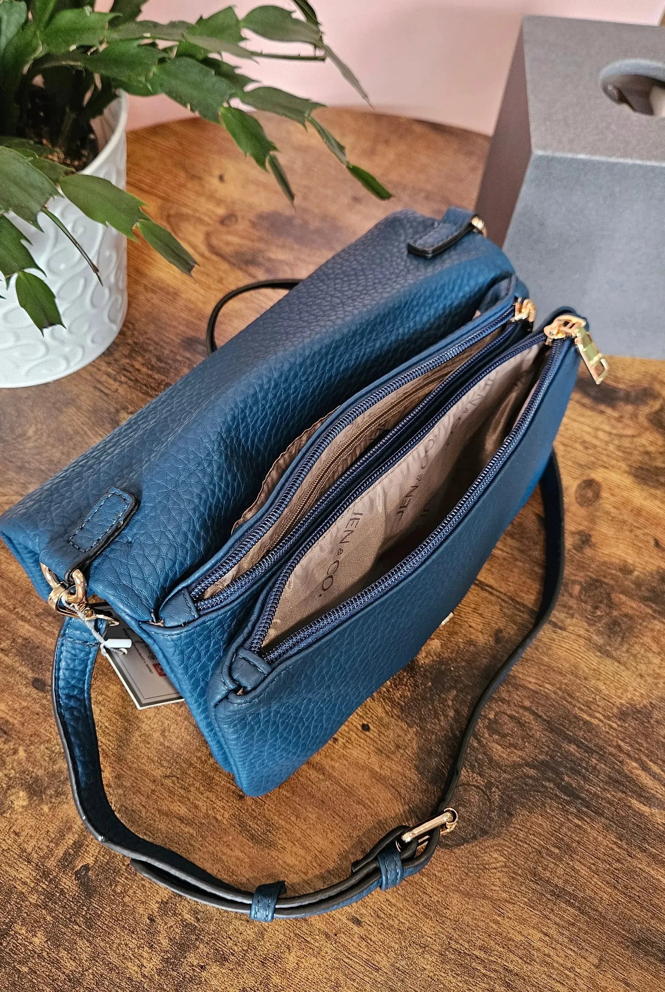 Shop Phiona Studded Crossbody | Peacock- at Ruby Joy Boutique, a Women's Clothing Store in Pickerington, Ohio