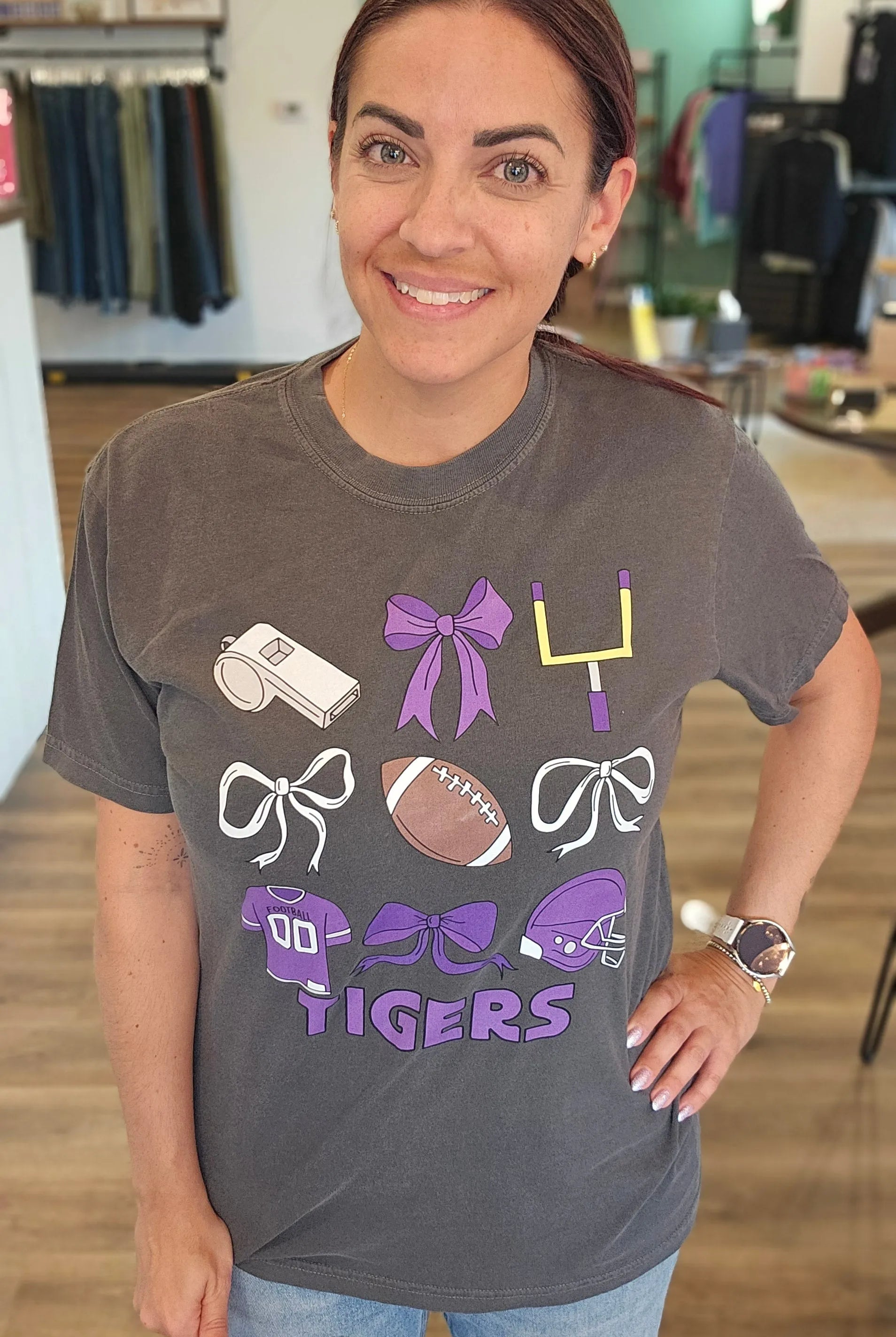 Shop Pickerington Football Bow Collage Stack Graphic Tee-Tigers at Ruby Joy Boutique, a Women's Clothing Store in Pickerington, Ohio