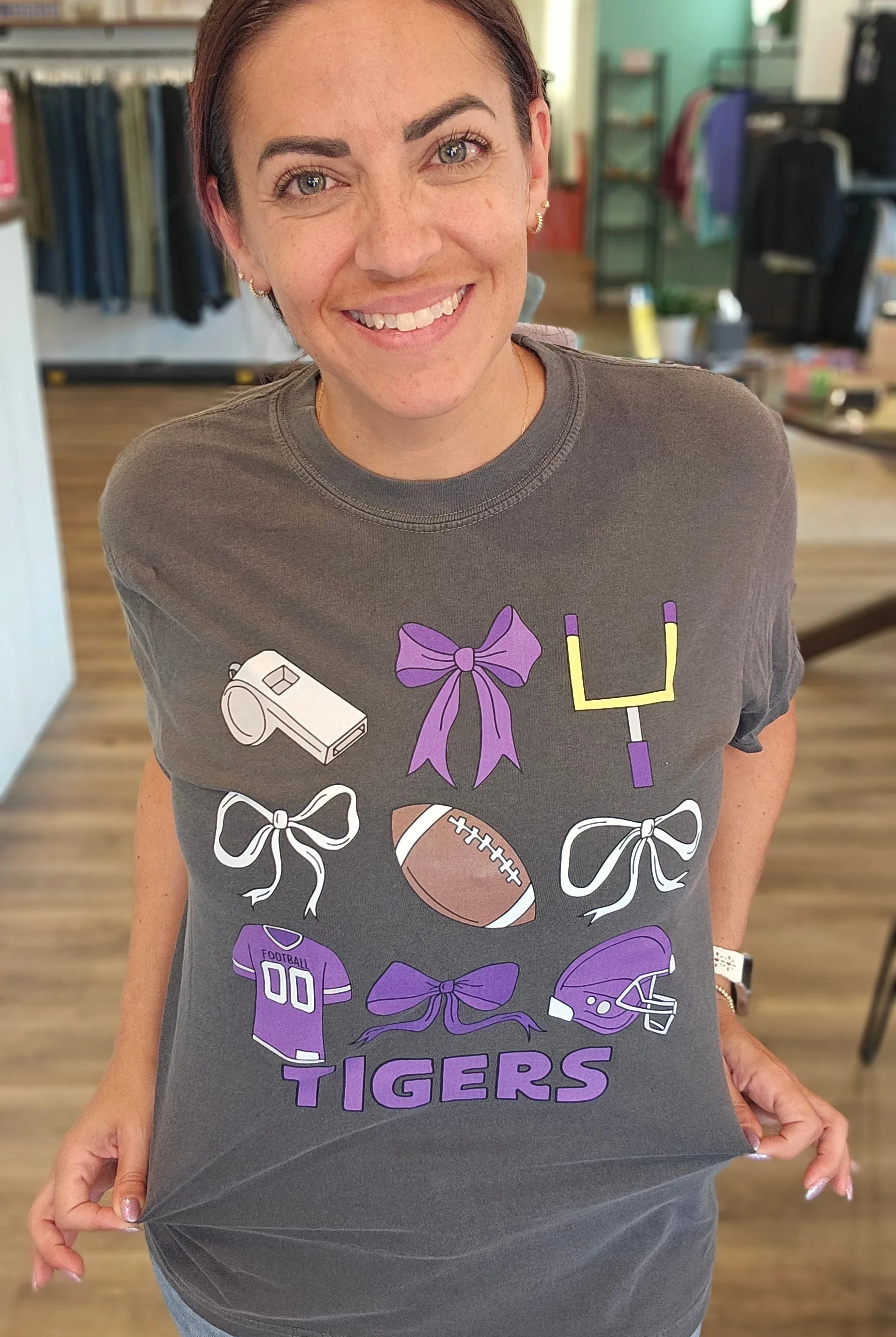 Shop Pickerington Football Bow Collage Stack Graphic Tee- at Ruby Joy Boutique, a Women's Clothing Store in Pickerington, Ohio