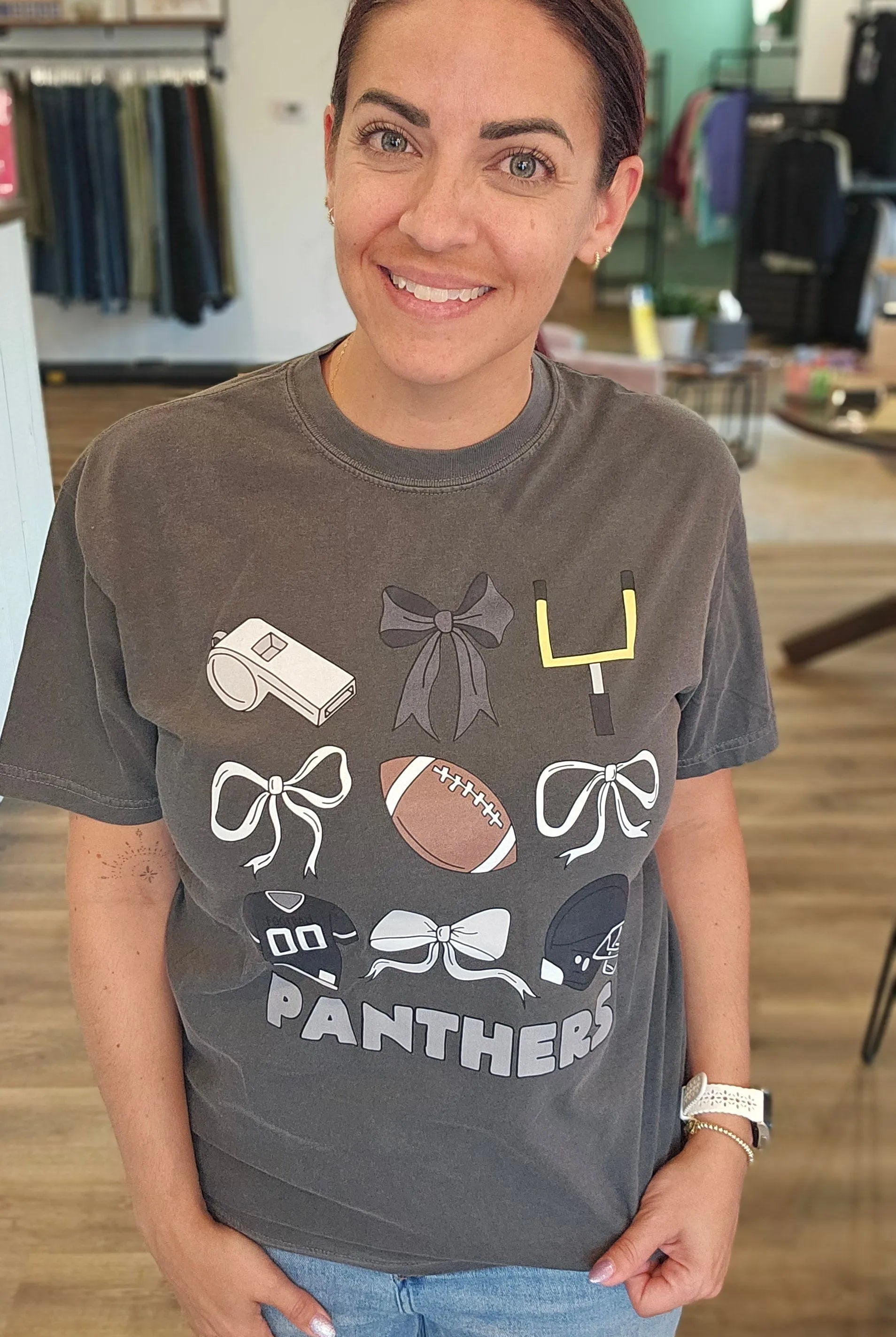 Shop Pickerington Football Bow Collage Stack Graphic Tee- at Ruby Joy Boutique, a Women's Clothing Store in Pickerington, Ohio