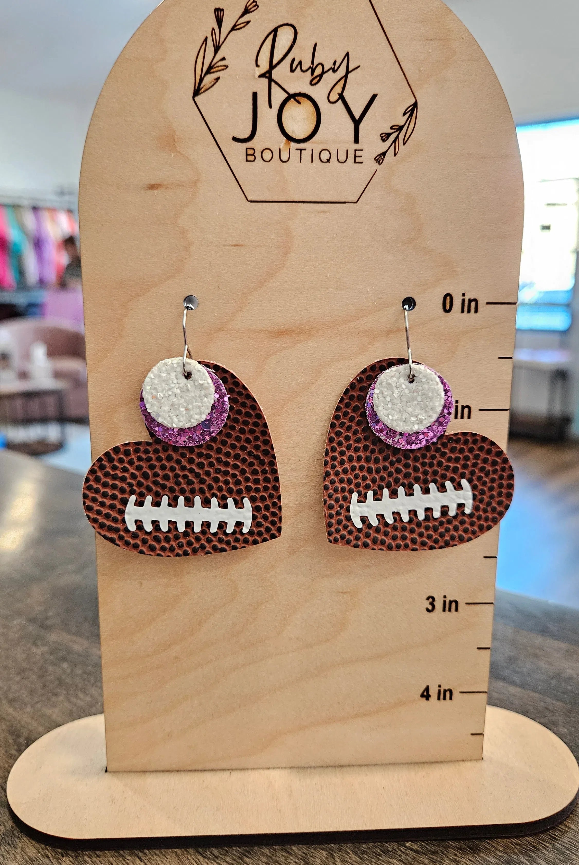 Shop Pickerington Sparkle Heart Football Earrings-Earrings at Ruby Joy Boutique, a Women's Clothing Store in Pickerington, Ohio