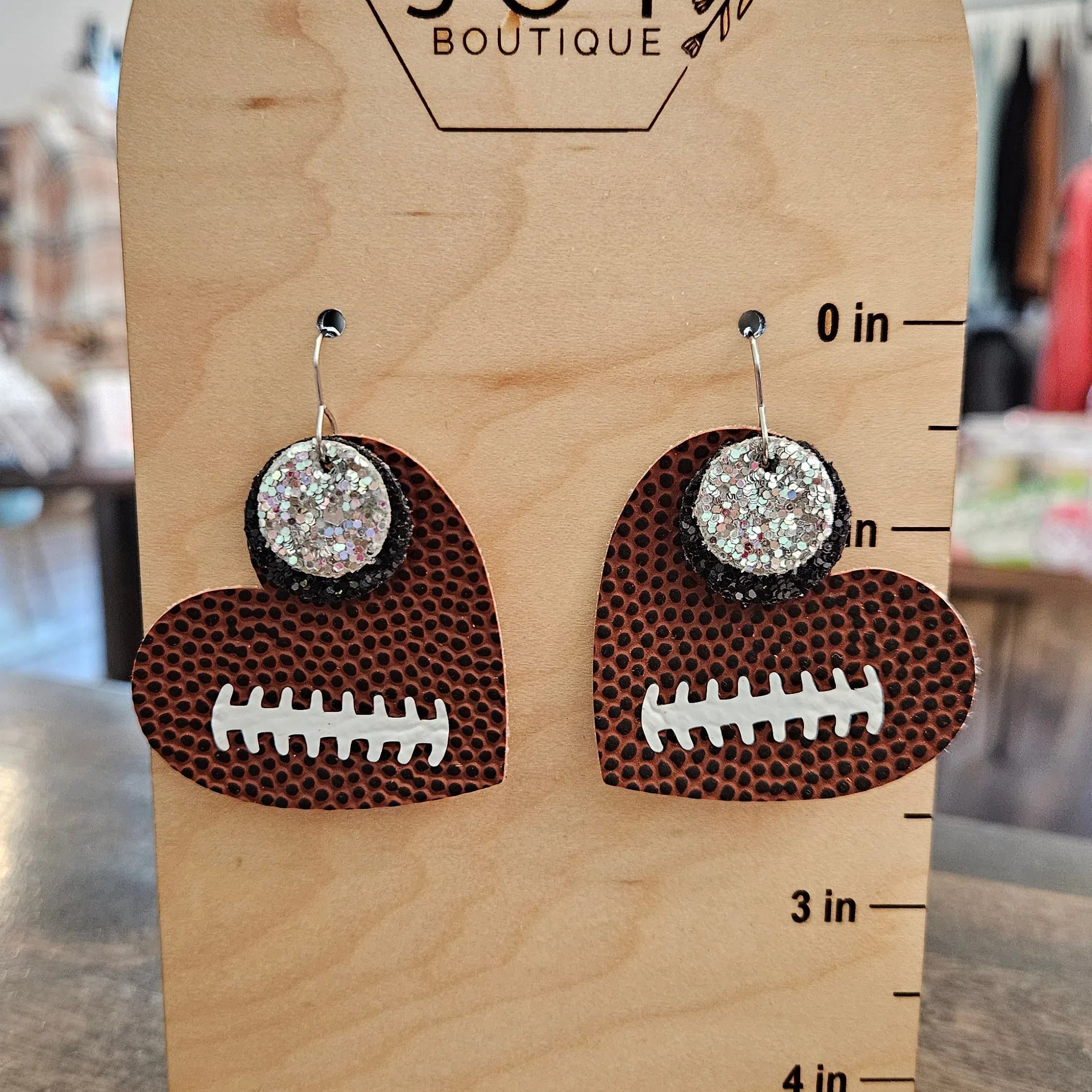 Shop Pickerington Sparkle Heart Football Earrings-Earrings at Ruby Joy Boutique, a Women's Clothing Store in Pickerington, Ohio