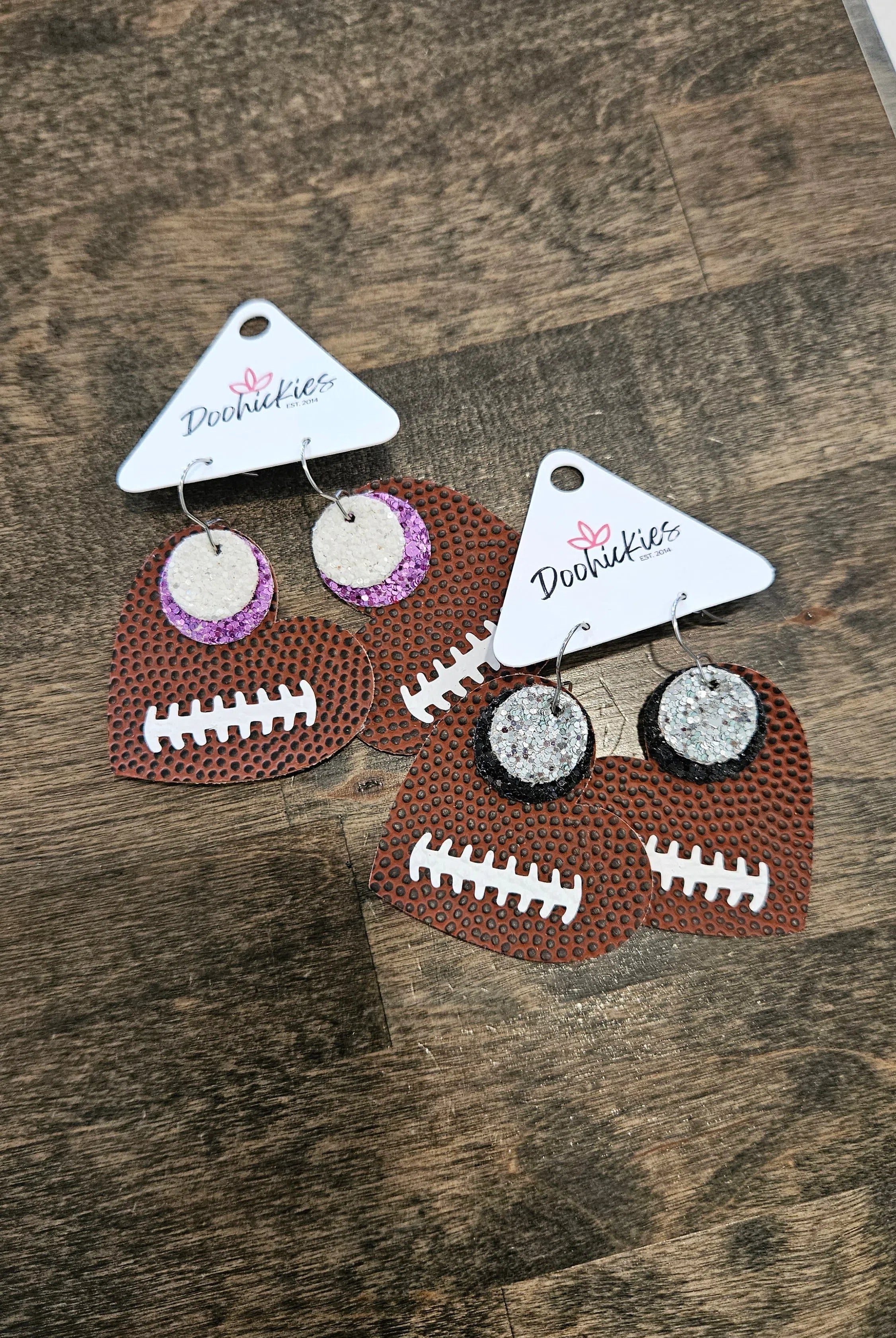 Shop Pickerington Sparkle Heart Football Earrings-Earrings at Ruby Joy Boutique, a Women's Clothing Store in Pickerington, Ohio