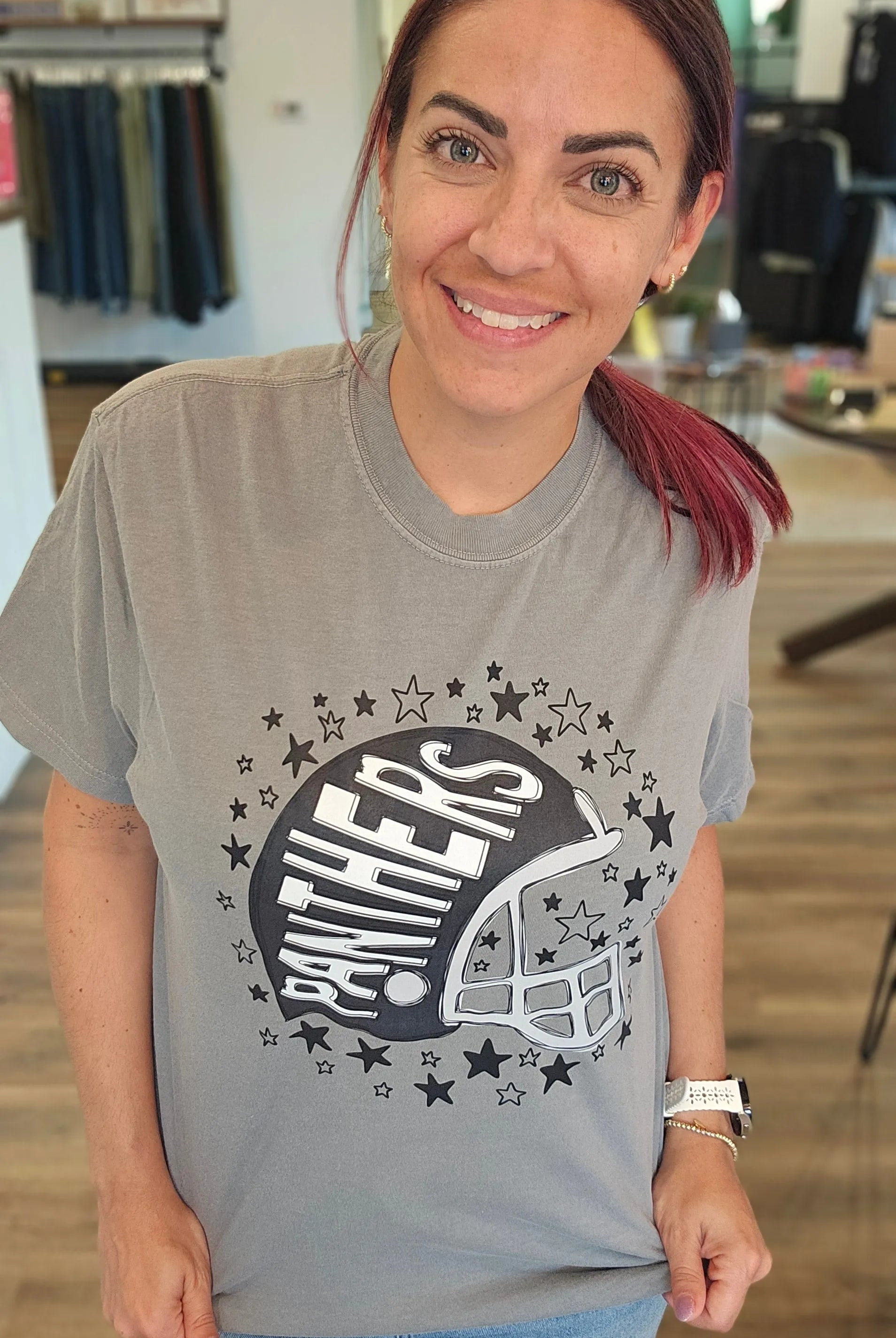 Shop Pickerington Starry Helmet Graphic Tee-Panthers at Ruby Joy Boutique, a Women's Clothing Store in Pickerington, Ohio