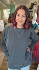 Shop Pigment Dyed Pullover with Pockets - Black-Small at Ruby Joy Boutique, a Women's Clothing Store in Pickerington, Ohio