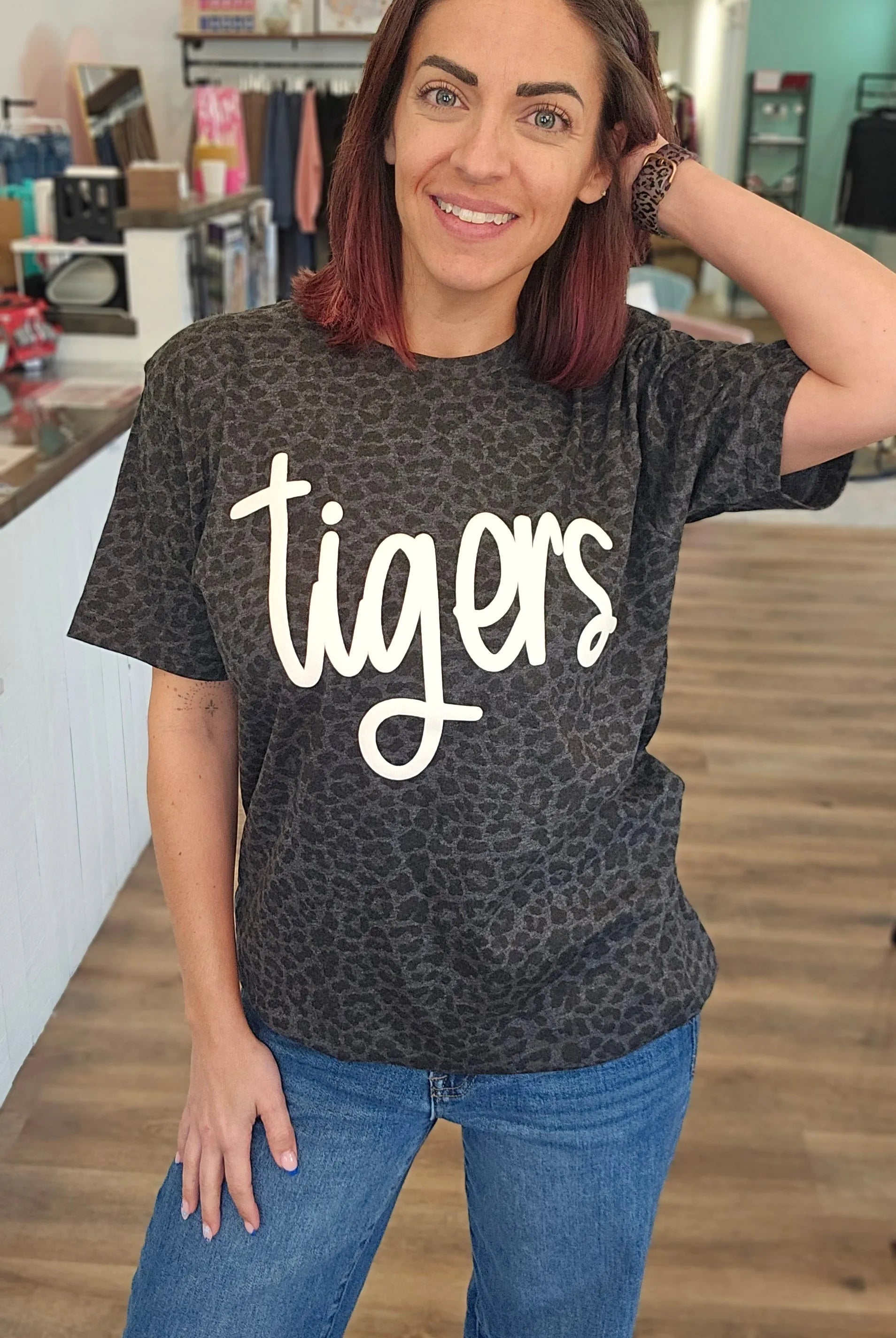 Shop Puff Print Script Mascot Leopard Print Tee- at Ruby Joy Boutique, a Women's Clothing Store in Pickerington, Ohio