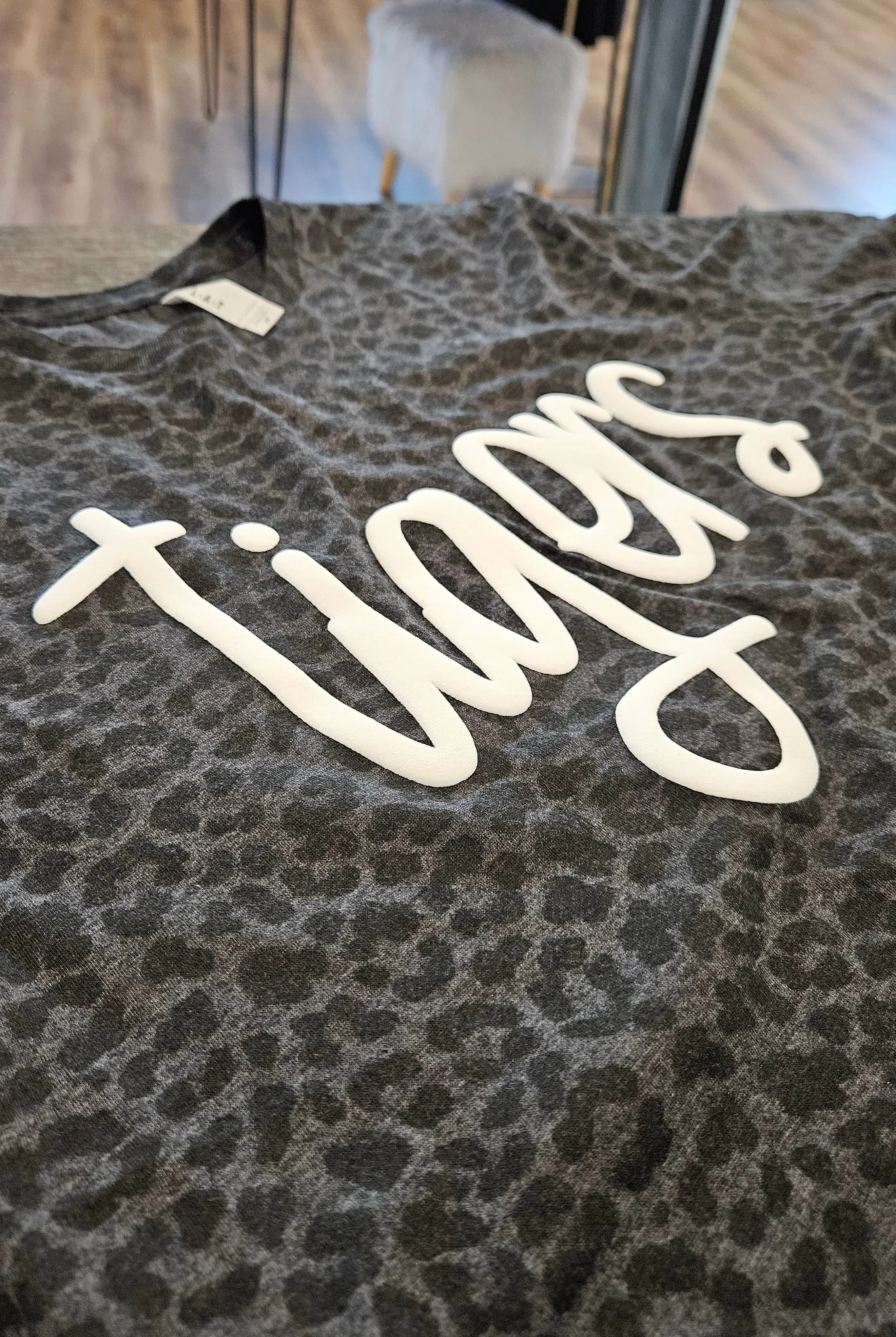 Shop Puff Print Script Mascot Leopard Print Tee- at Ruby Joy Boutique, a Women's Clothing Store in Pickerington, Ohio