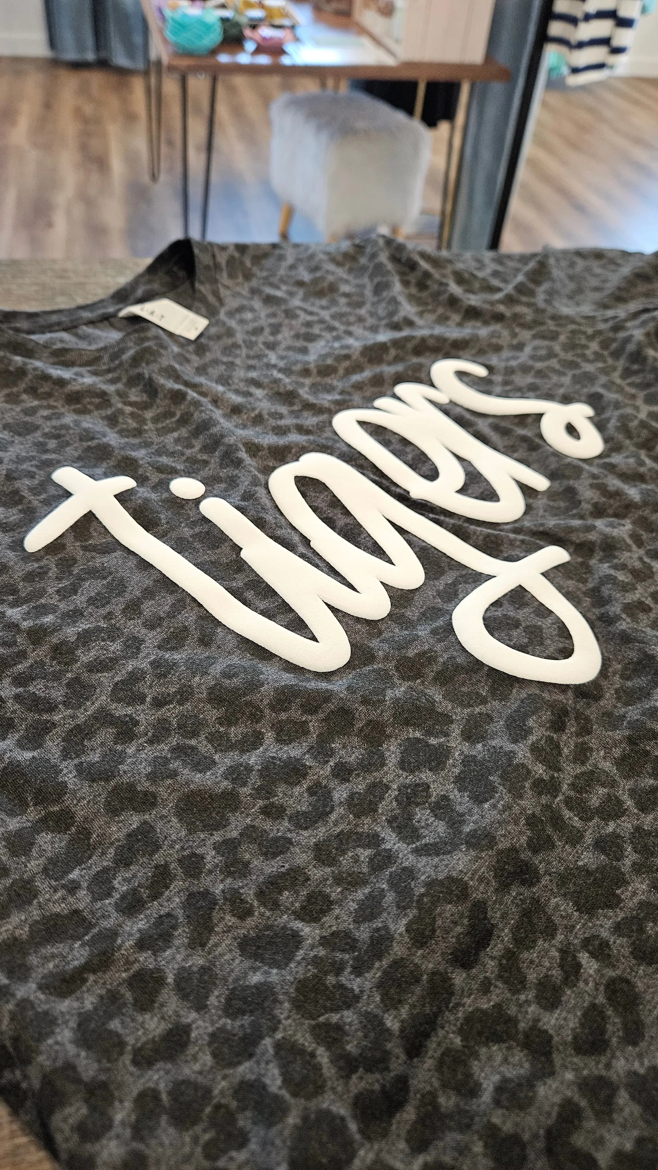 Shop Puff Print Script Mascot Leopard Print Tee- at Ruby Joy Boutique, a Women's Clothing Store in Pickerington, Ohio