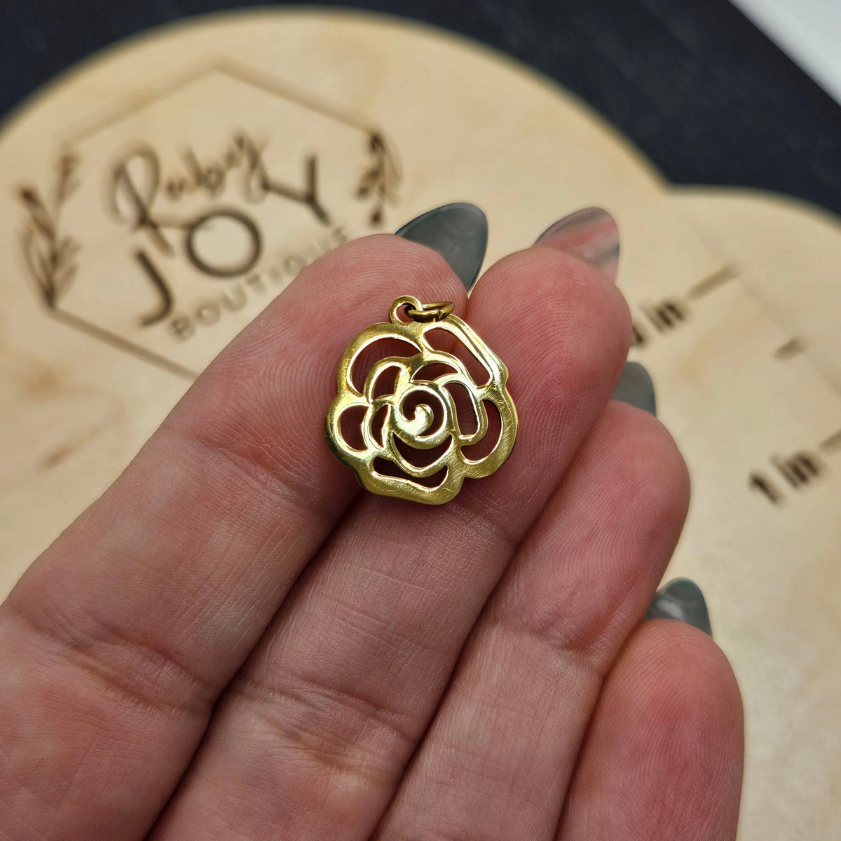 Shop Rose Outline Charm- at Ruby Joy Boutique, a Women's Clothing Store in Pickerington, Ohio