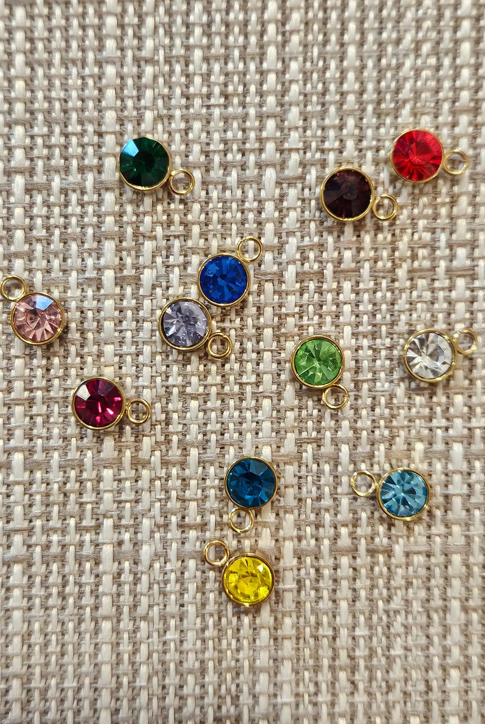 Shop Round Birthstone Charms-Charms at Ruby Joy Boutique, a Women's Clothing Store in Pickerington, Ohio