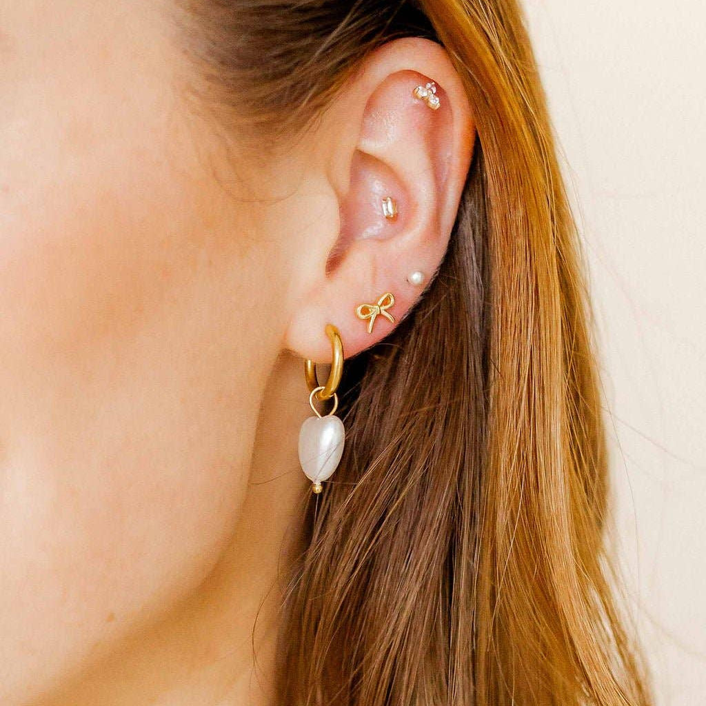 Shop Sadie Bow Screwback Stud Earrings- at Ruby Joy Boutique, a Women's Clothing Store in Pickerington, Ohio