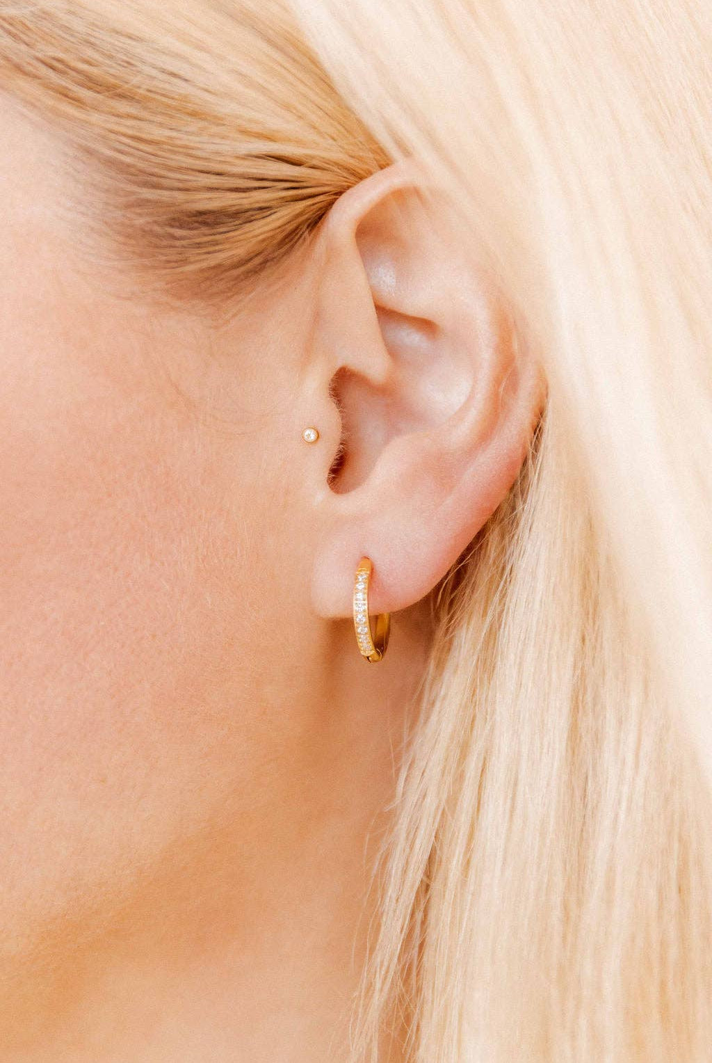 Shop Scarlett Huggie Hoop Earrings - 12mm- at Ruby Joy Boutique, a Women's Clothing Store in Pickerington, Ohio