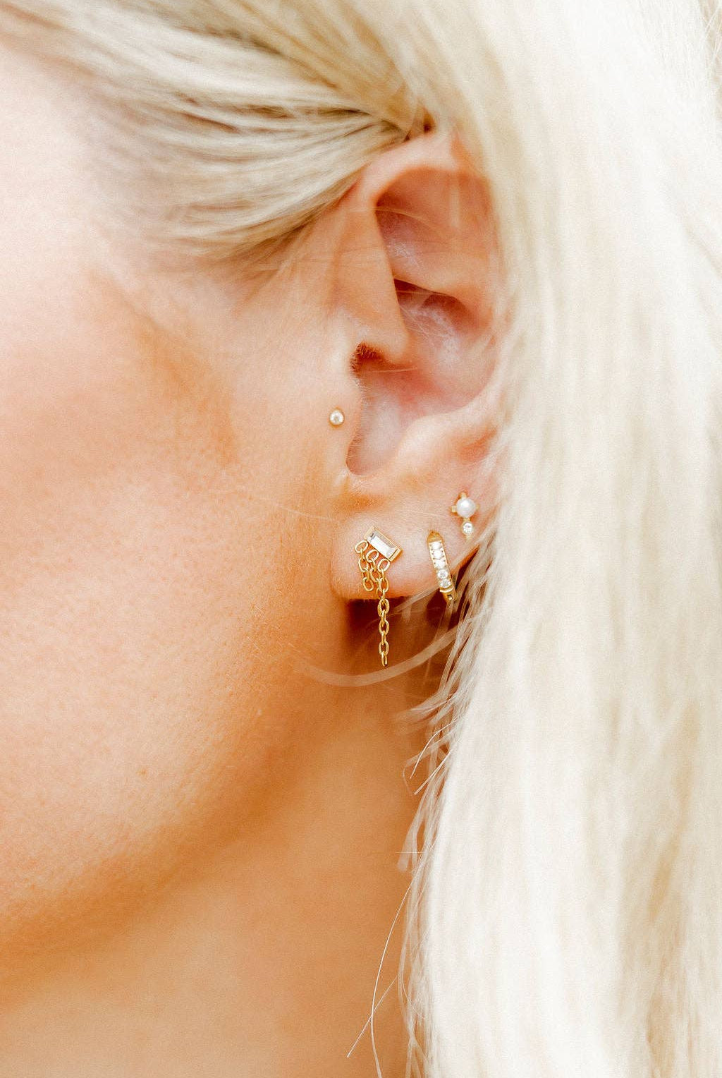 Shop Scarlett Huggie Hoop Earrings - 8mm- at Ruby Joy Boutique, a Women's Clothing Store in Pickerington, Ohio