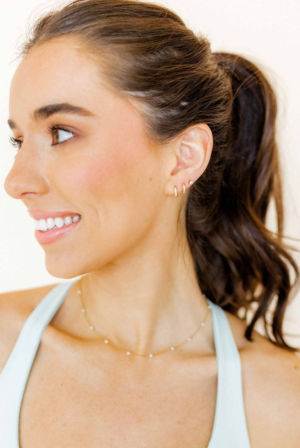 Shop Scarlett Huggie Hoop Earrings - 8mm- at Ruby Joy Boutique, a Women's Clothing Store in Pickerington, Ohio