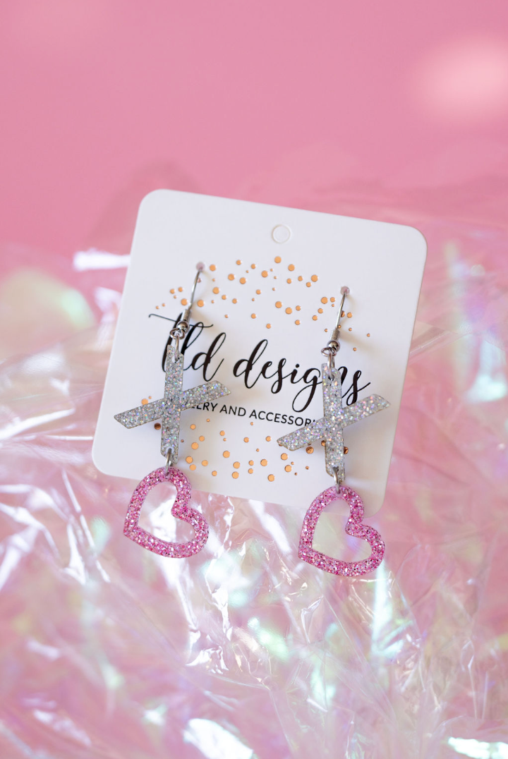 Shop XOXO Heart Glitter Dangle Earrings- at Ruby Joy Boutique, a Women's Clothing Store in Pickerington, Ohio