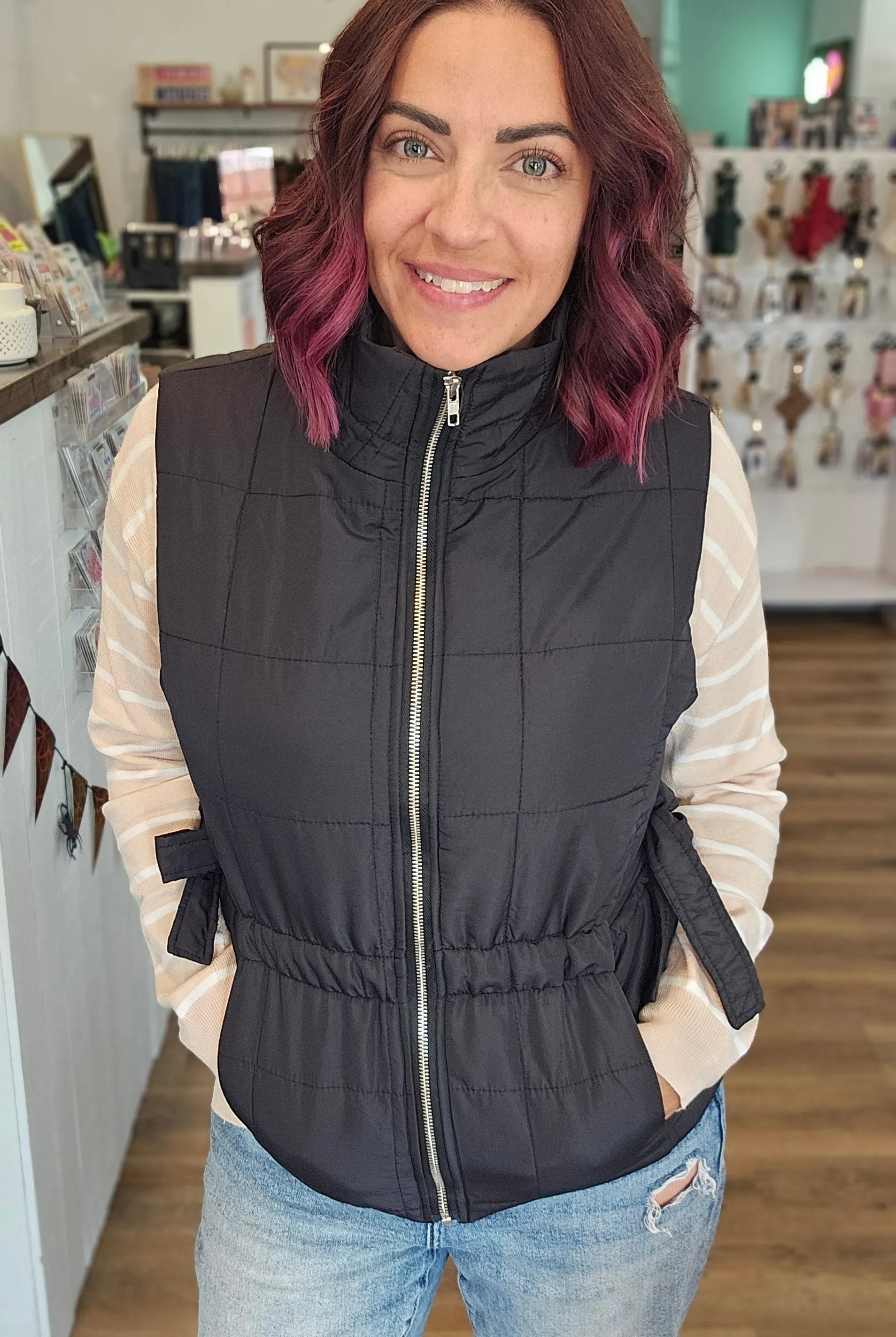 Shop Side Tie Quilted Puffer Vest - Black- at Ruby Joy Boutique, a Women's Clothing Store in Pickerington, Ohio
