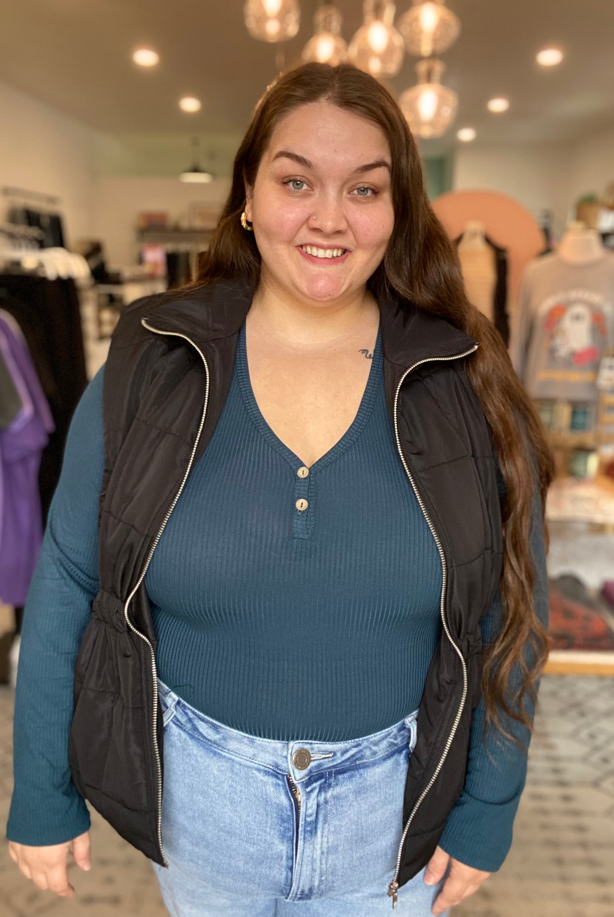 Shop Side Tie Quilted Puffer Vest - Black- at Ruby Joy Boutique, a Women's Clothing Store in Pickerington, Ohio