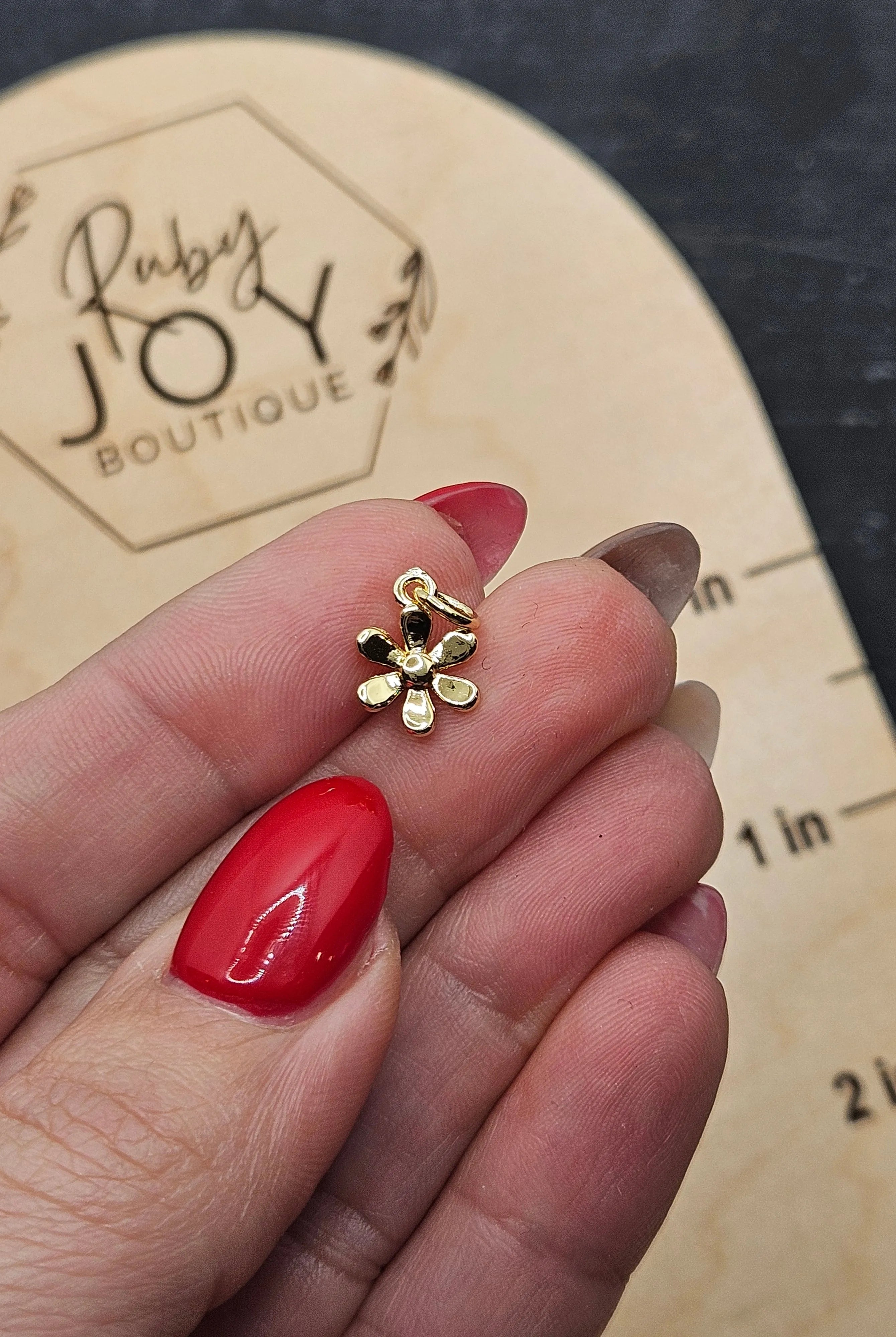 Shop Simple Daisy Charm- at Ruby Joy Boutique, a Women's Clothing Store in Pickerington, Ohio