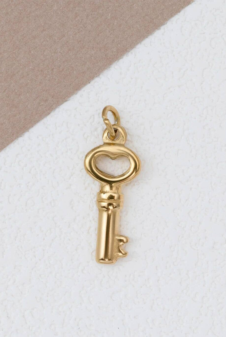 Shop Skeleton Key Charm- at Ruby Joy Boutique, a Women's Clothing Store in Pickerington, Ohio
