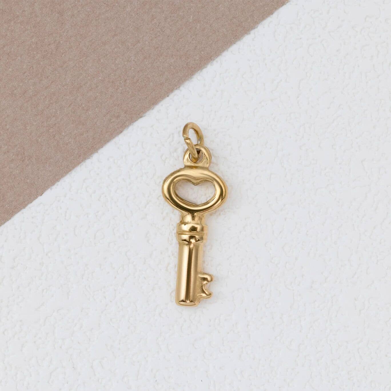 Shop Skeleton Key Charm- at Ruby Joy Boutique, a Women's Clothing Store in Pickerington, Ohio
