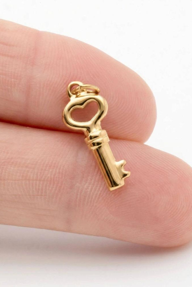 Shop Skeleton Key Charm- at Ruby Joy Boutique, a Women's Clothing Store in Pickerington, Ohio