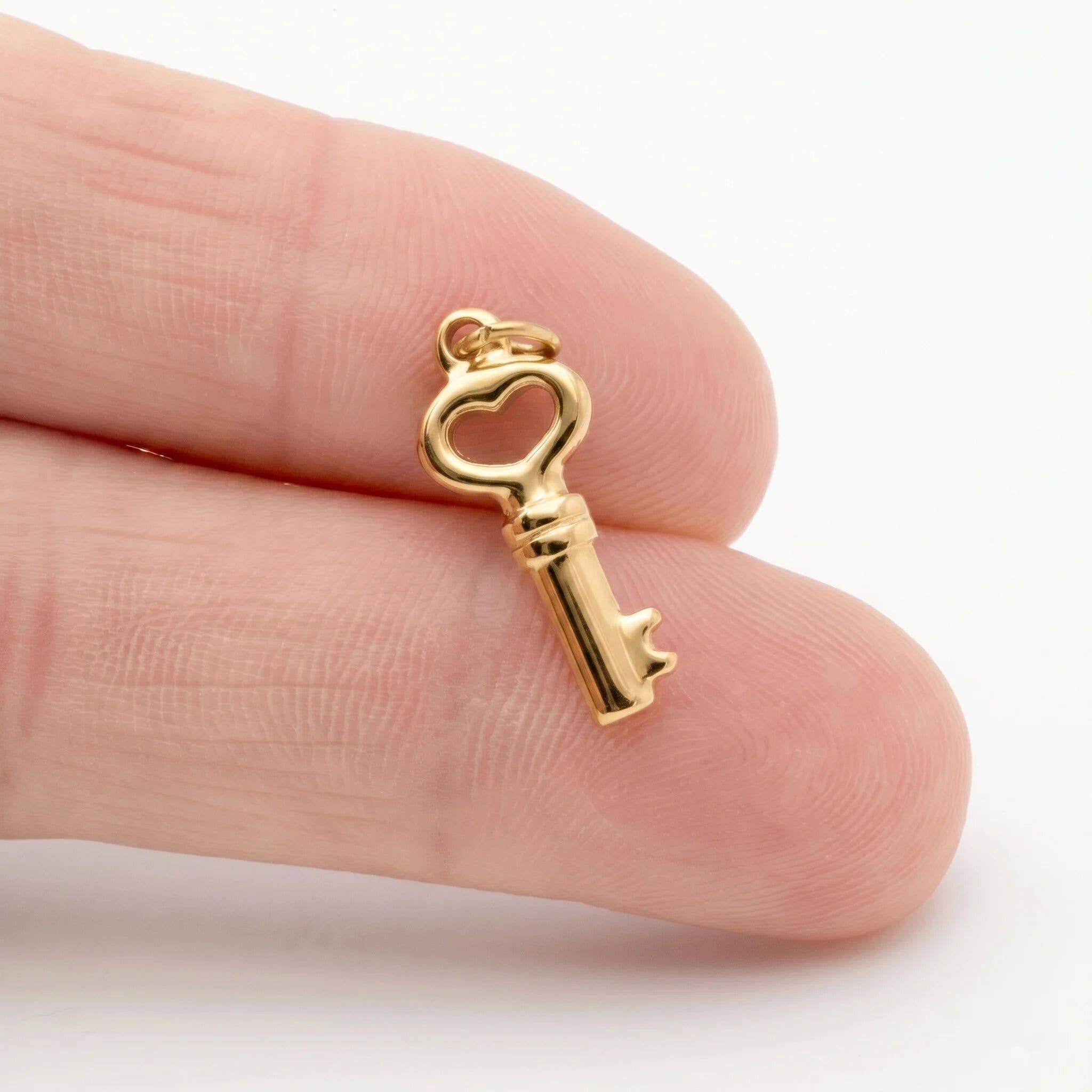 Shop Skeleton Key Charm- at Ruby Joy Boutique, a Women's Clothing Store in Pickerington, Ohio