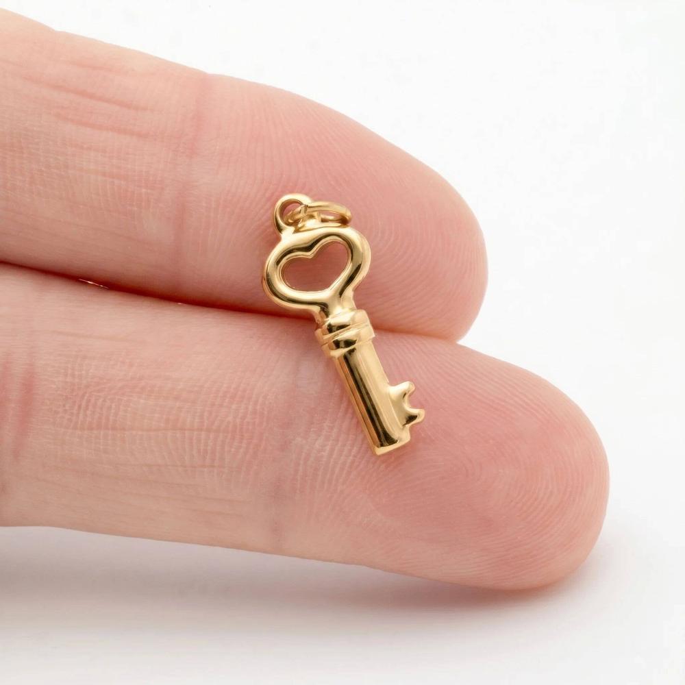 Shop Skeleton Key Charm- at Ruby Joy Boutique, a Women's Clothing Store in Pickerington, Ohio