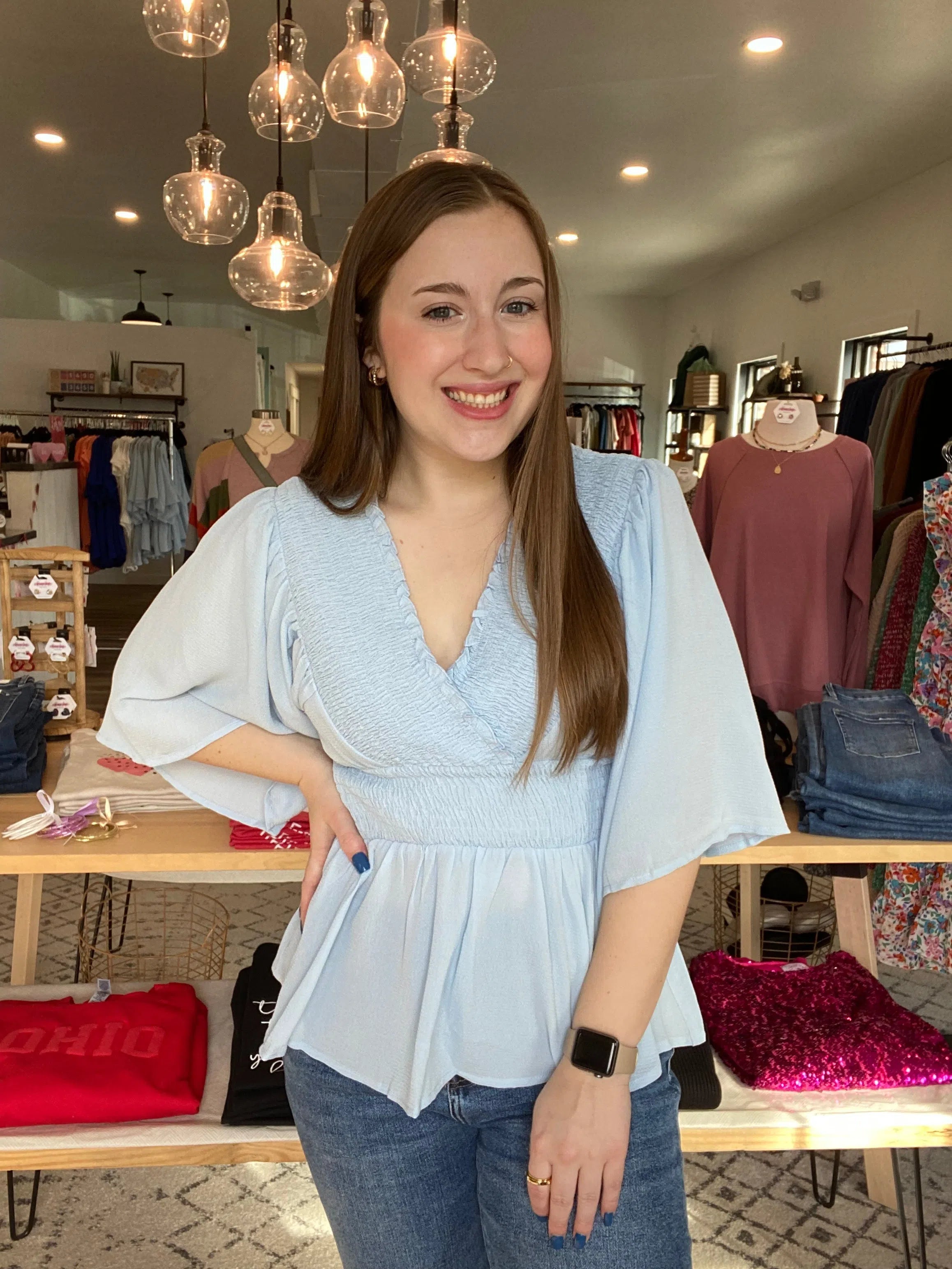 Shop Smocked Surplice Peplum Blouse - Baby Blue-Blouse at Ruby Joy Boutique, a Women's Clothing Store in Pickerington, Ohio