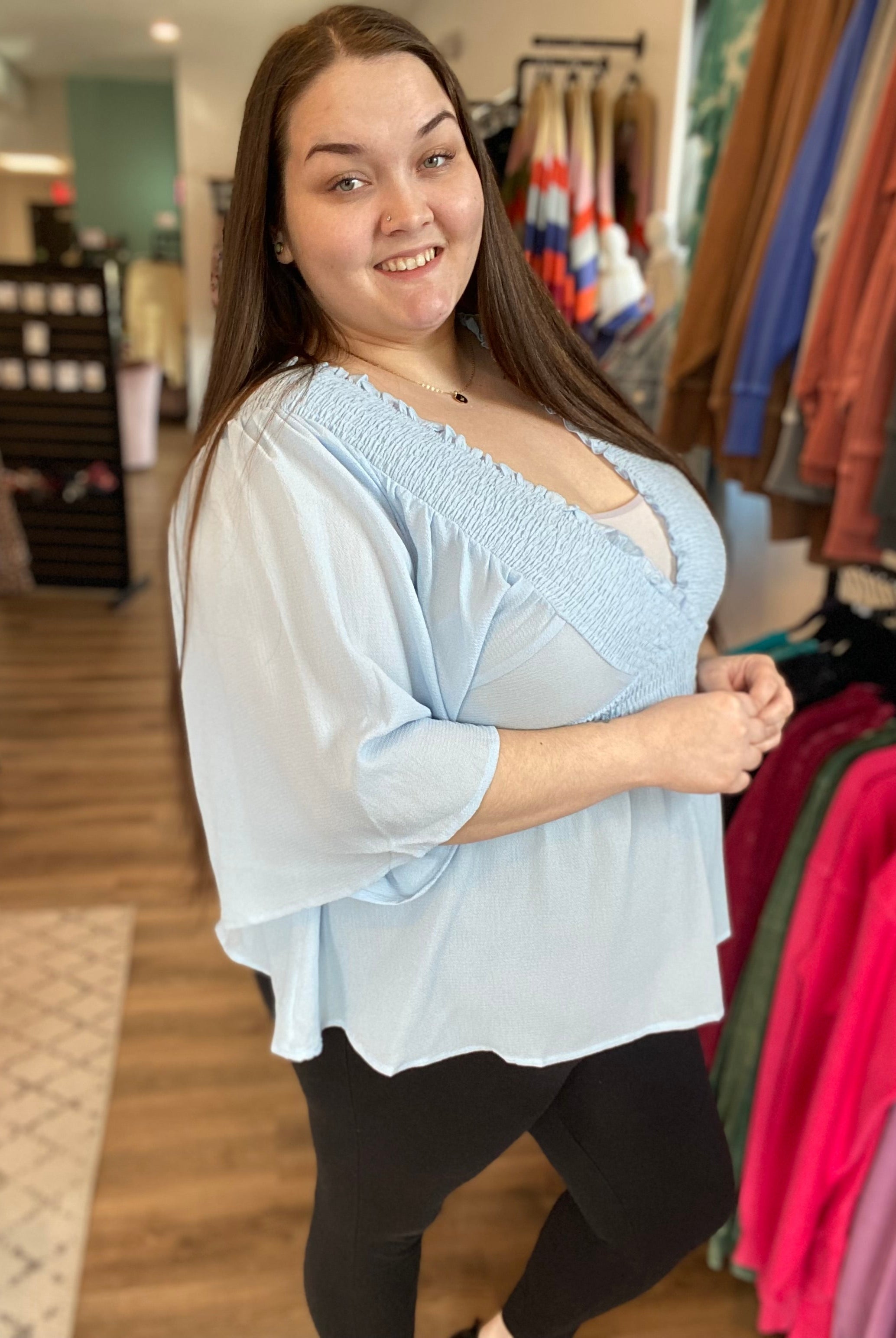 Shop Smocked Surplice Peplum Blouse - Baby Blue-Blouse at Ruby Joy Boutique, a Women's Clothing Store in Pickerington, Ohio