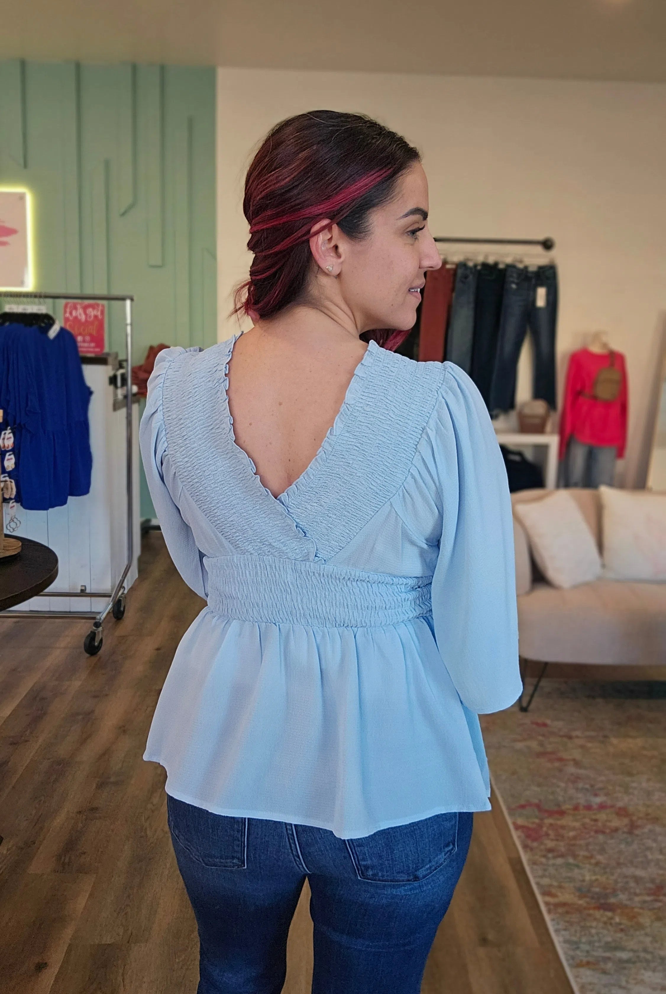 Shop Smocked Surplice Peplum Blouse - Baby Blue-Blouse at Ruby Joy Boutique, a Women's Clothing Store in Pickerington, Ohio