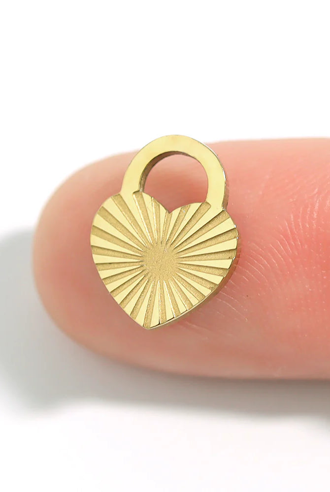 Shop Sunburst Heart Lock Charm- at Ruby Joy Boutique, a Women's Clothing Store in Pickerington, Ohio