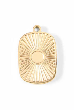 Shop Sunburst Medallion Charm- at Ruby Joy Boutique, a Women's Clothing Store in Pickerington, Ohio