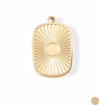 Shop Sunburst Medallion Charm- at Ruby Joy Boutique, a Women's Clothing Store in Pickerington, Ohio