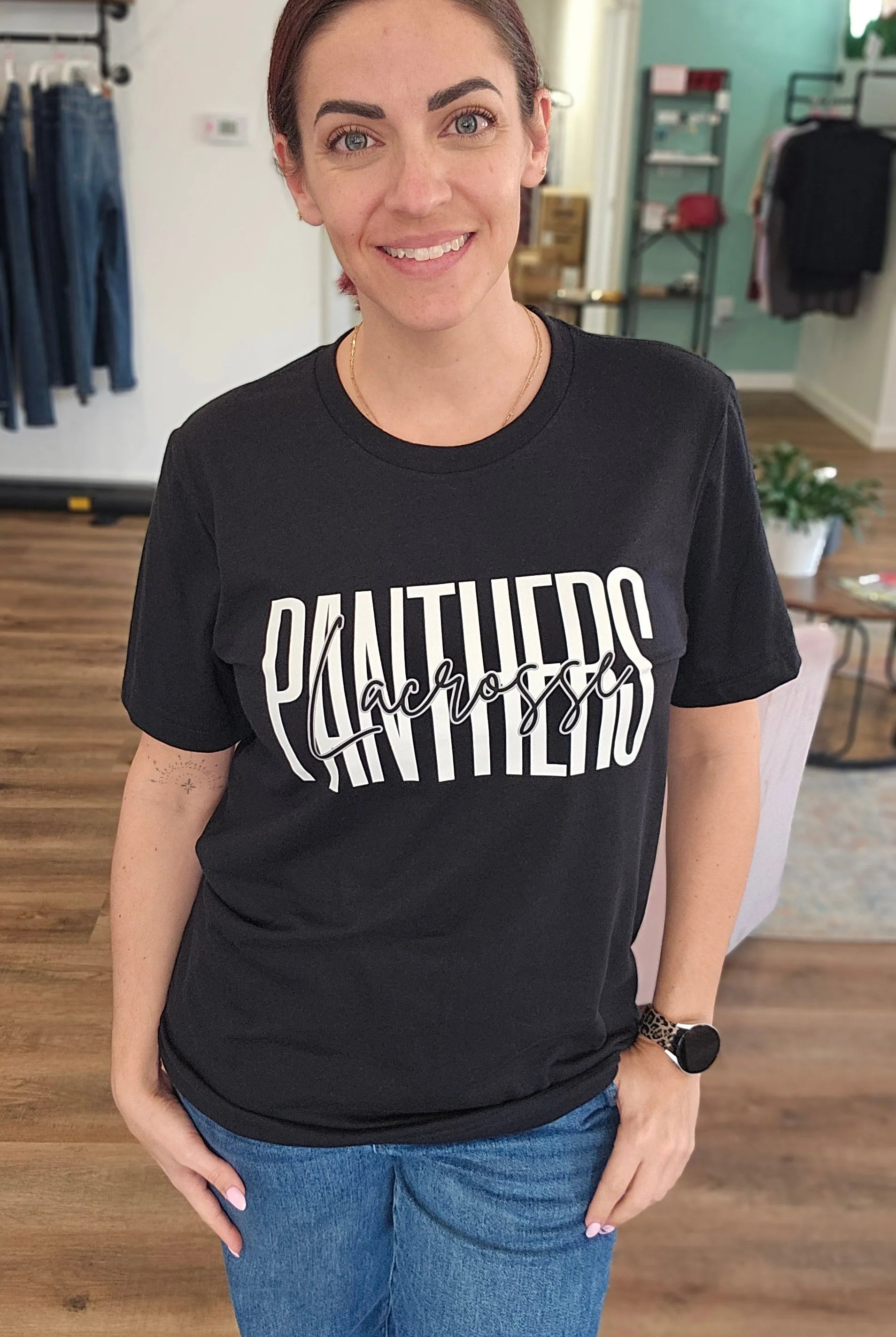 Shop Tall Lacrosse Mascot Text Graphic Top- at Ruby Joy Boutique, a Women's Clothing Store in Pickerington, Ohio