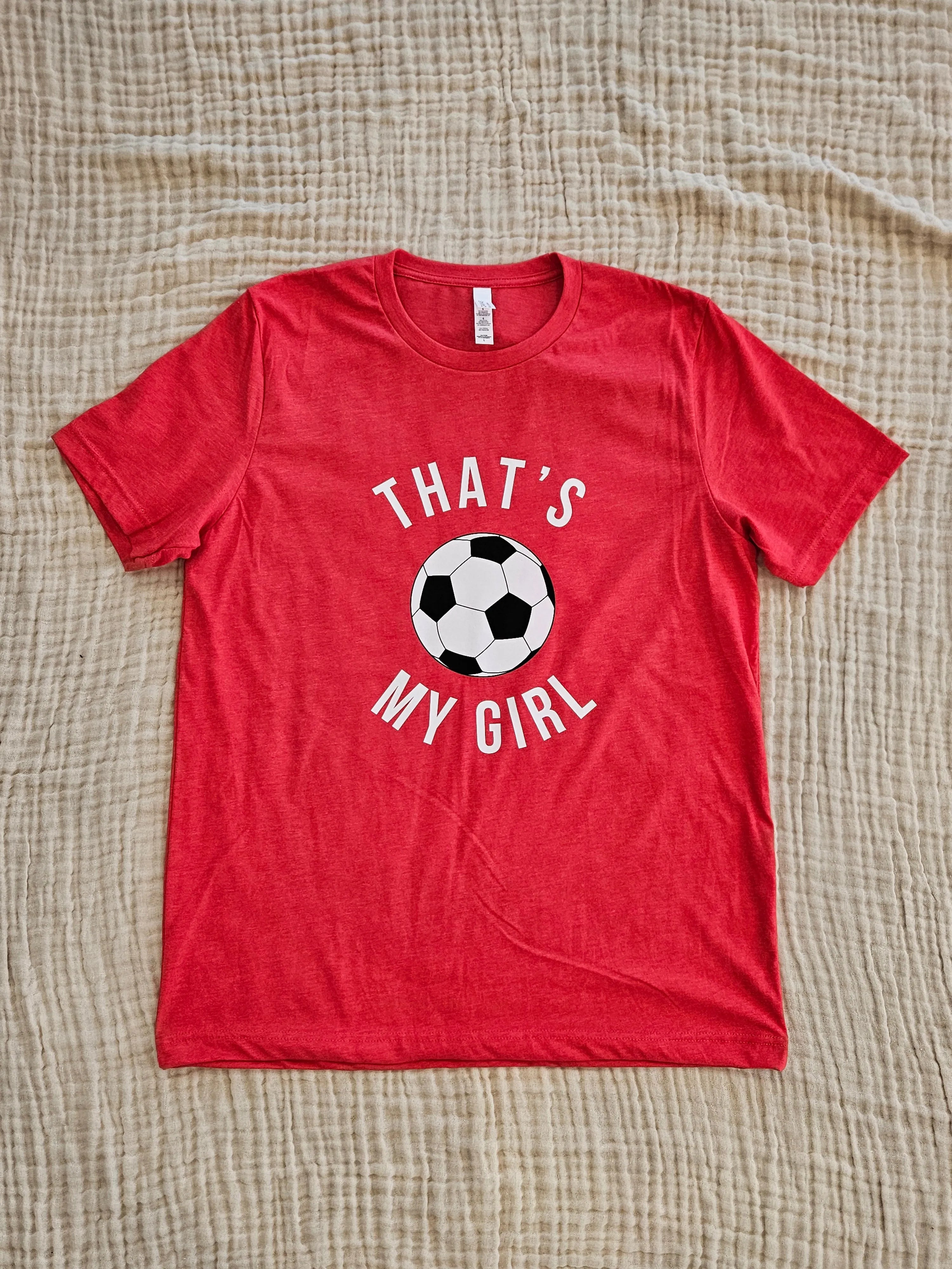 Shop That's My Girl Soccer Graphic Tee- at Ruby Joy Boutique, a Women's Clothing Store in Pickerington, Ohio