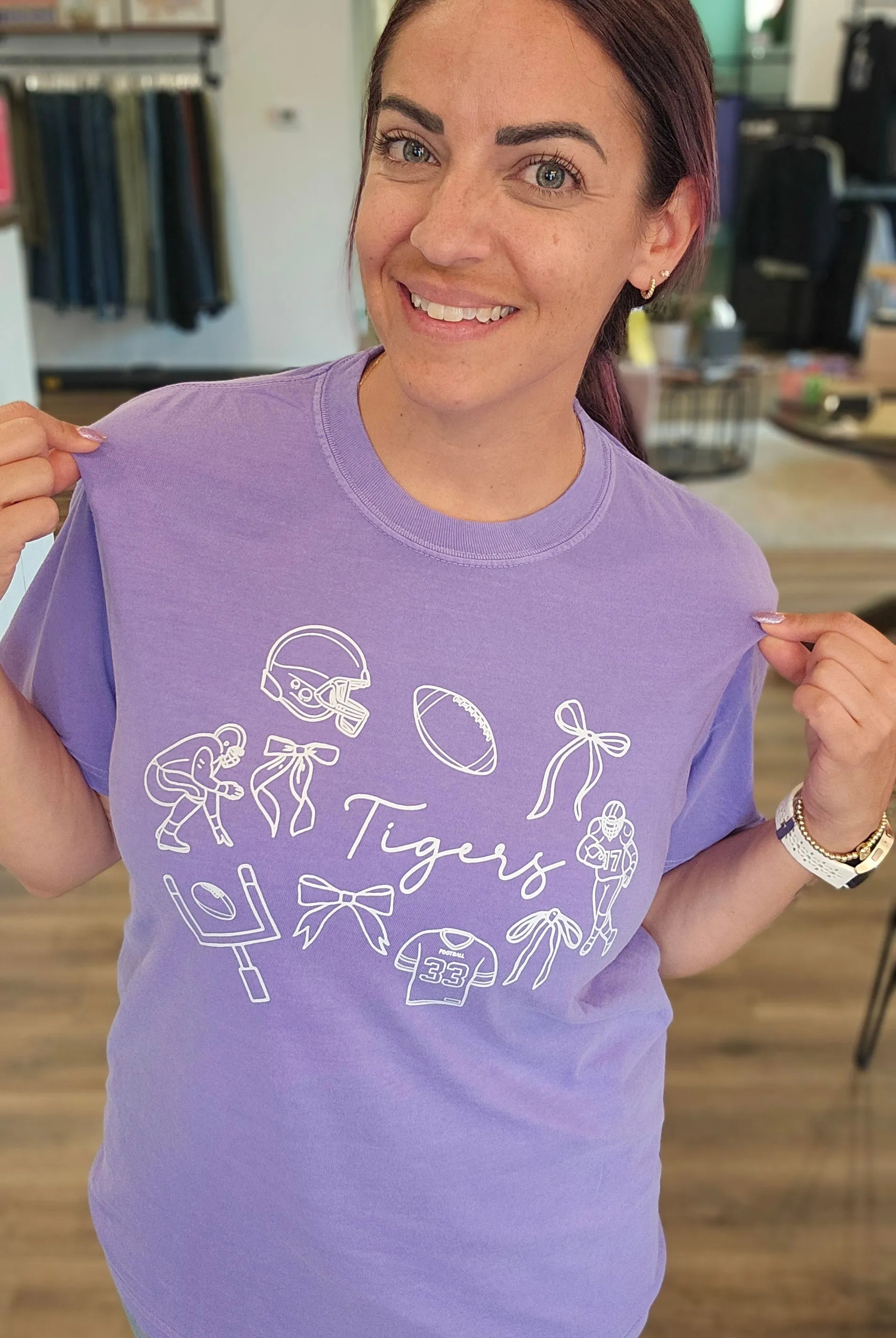 Shop Tigers Football Collage Graphic Tee- at Ruby Joy Boutique, a Women's Clothing Store in Pickerington, Ohio