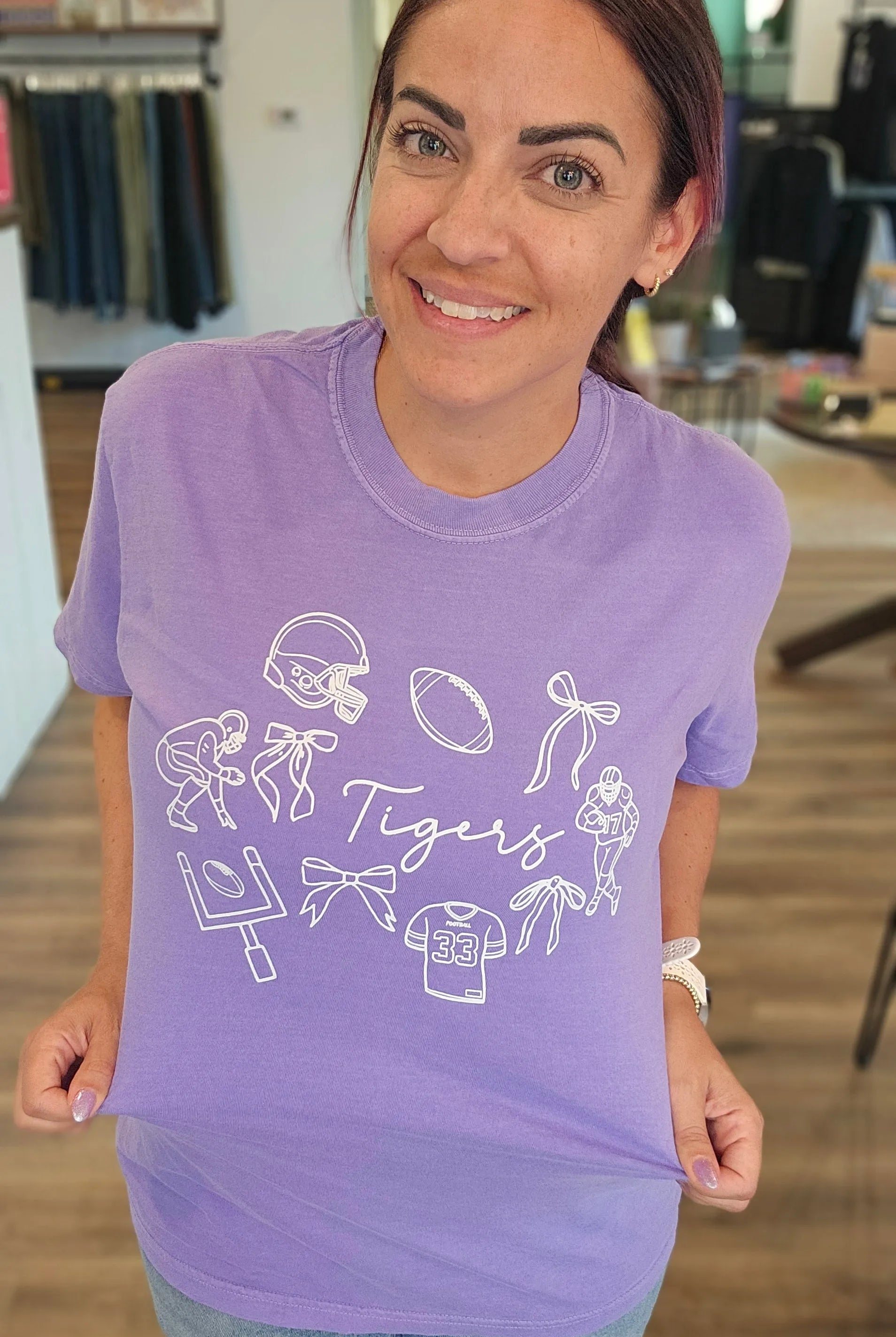 Shop Tigers Football Collage Graphic Tee- at Ruby Joy Boutique, a Women's Clothing Store in Pickerington, Ohio