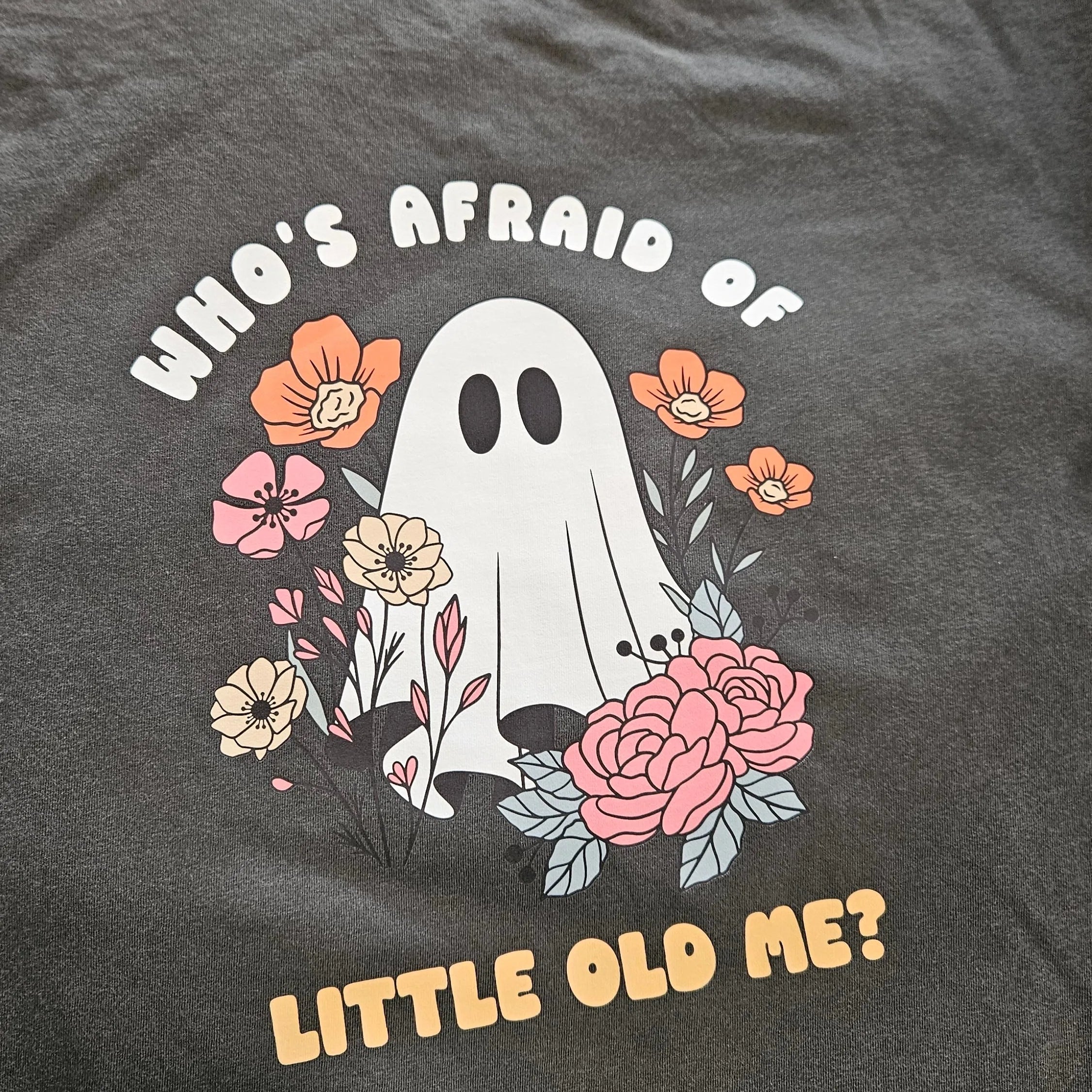 Shop Who's Afraid Of Little Old Me? Ghost Graphic-Small at Ruby Joy Boutique, a Women's Clothing Store in Pickerington, Ohio