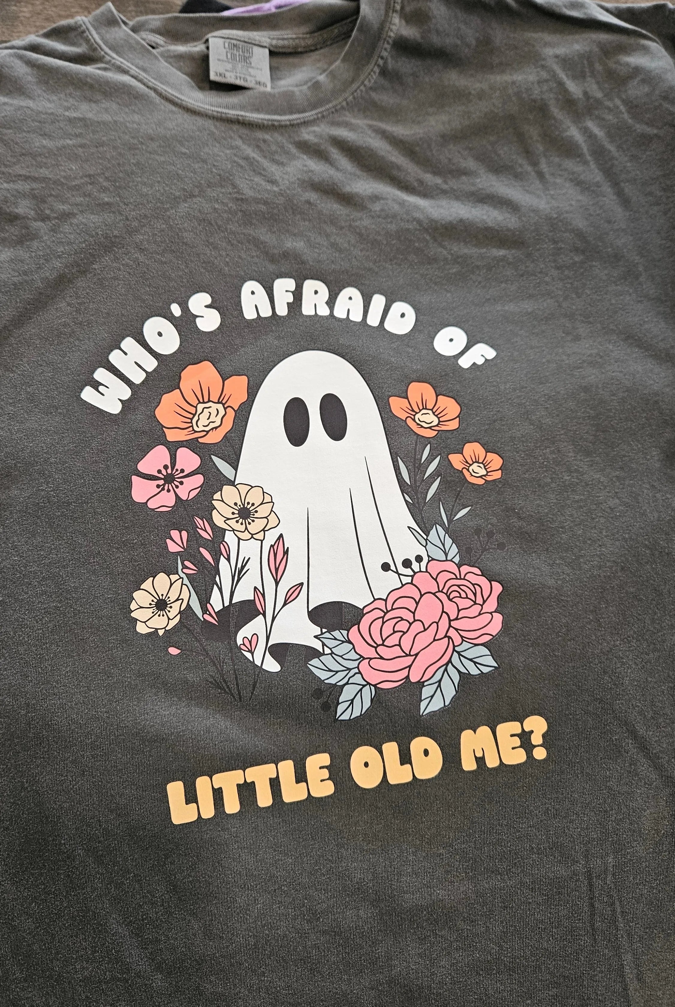 Shop Who's Afraid Of Little Old Me? Ghost Graphic-Small at Ruby Joy Boutique, a Women's Clothing Store in Pickerington, Ohio