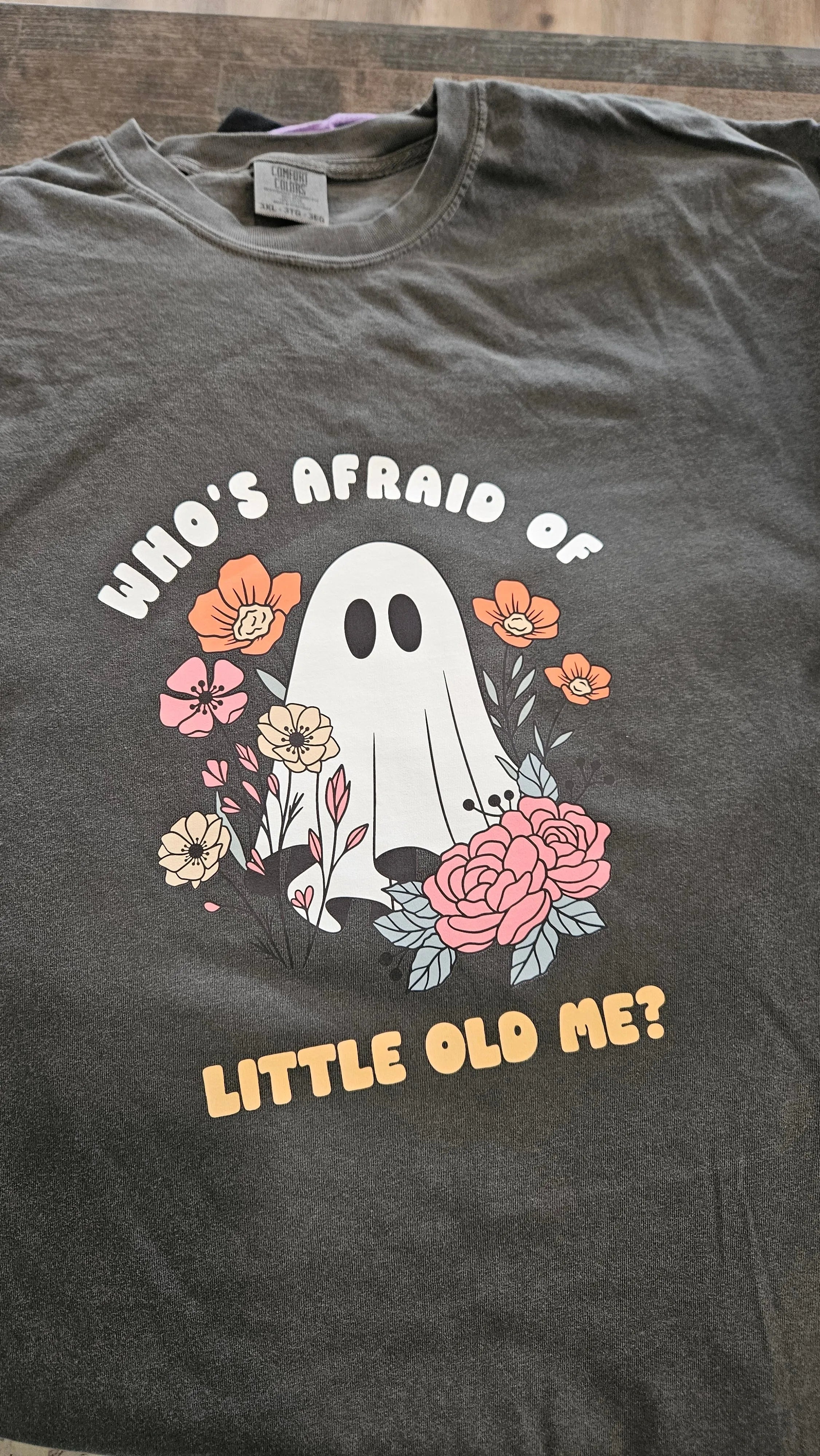 Shop Who's Afraid Of Little Old Me? Ghost Graphic-Small at Ruby Joy Boutique, a Women's Clothing Store in Pickerington, Ohio