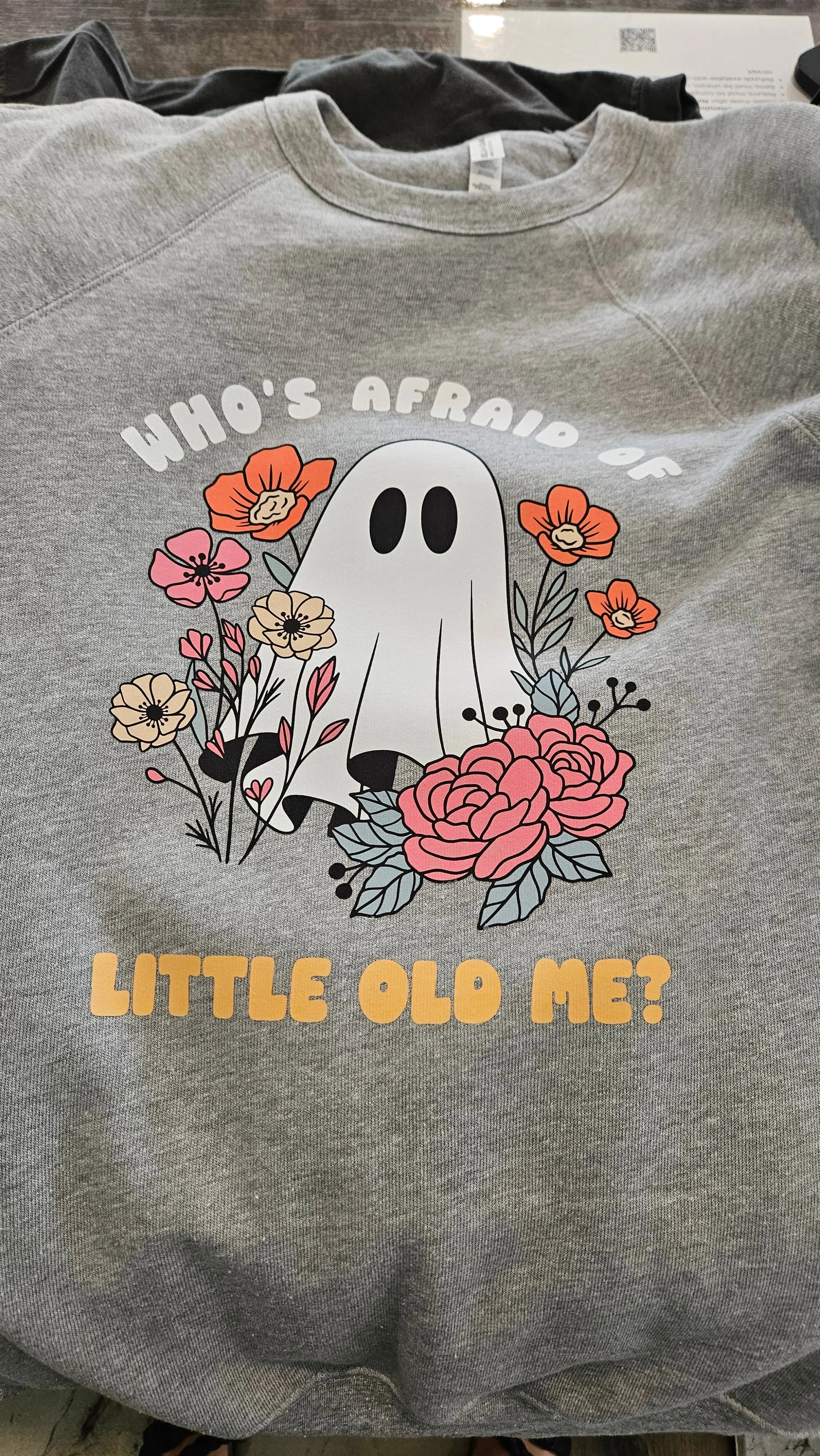 Shop Who's Afraid Of Little Old Me? Ghost Graphic-Small at Ruby Joy Boutique, a Women's Clothing Store in Pickerington, Ohio