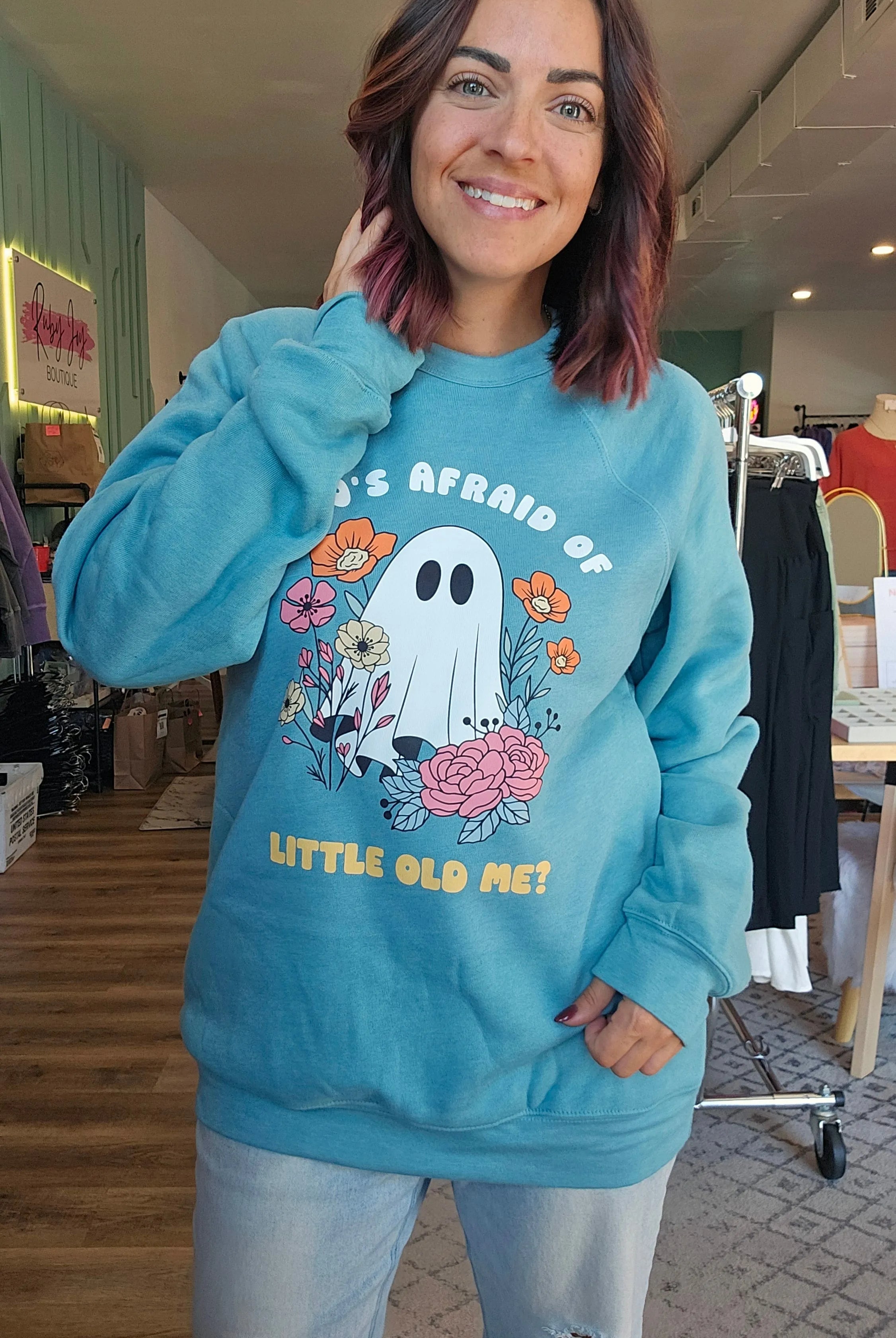 Shop Who's Afraid Of Little Old Me? Ghost Graphic-Small at Ruby Joy Boutique, a Women's Clothing Store in Pickerington, Ohio