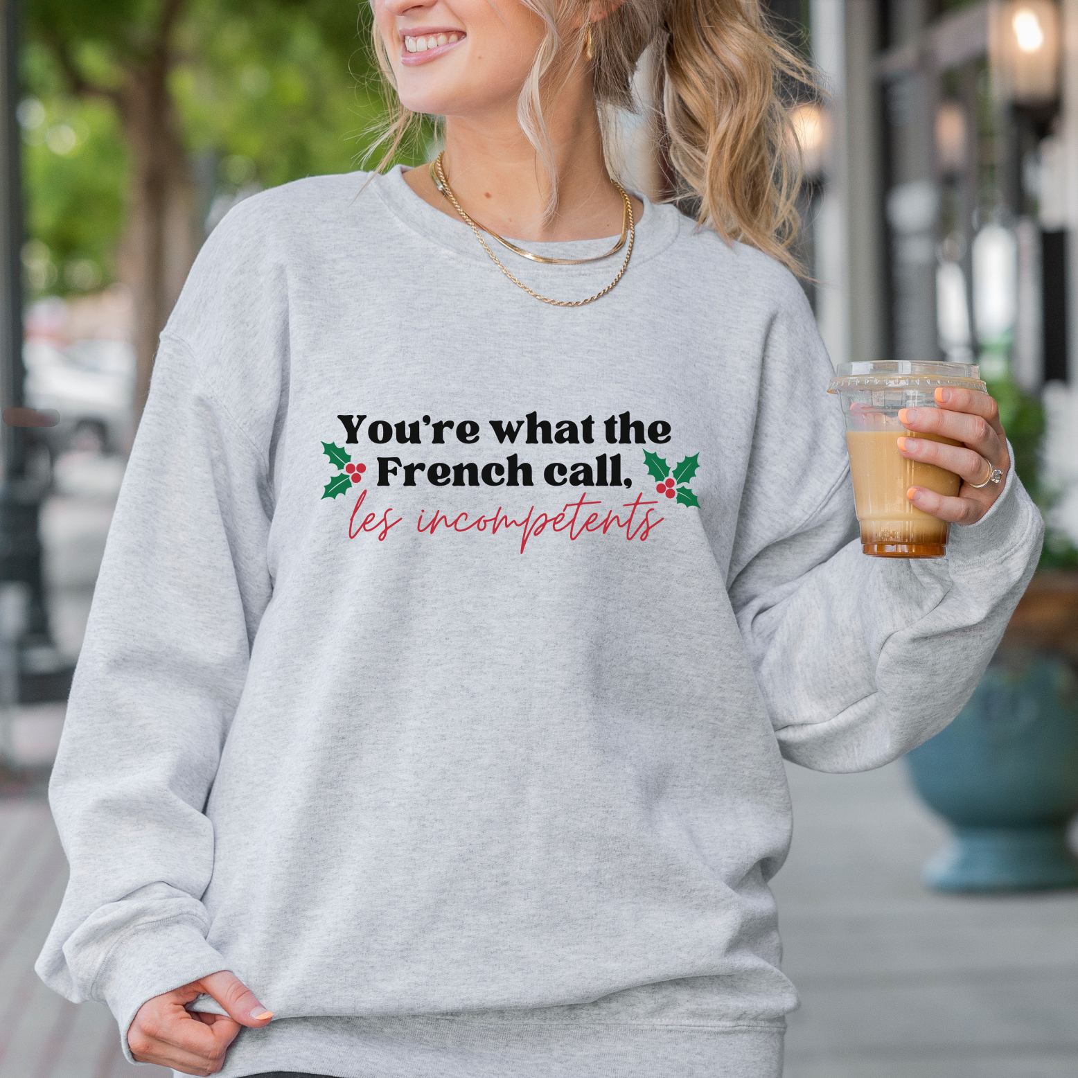 Shop You're What The French Call Les Incompétents Graphic Top | Home Alone Christmas- at Ruby Joy Boutique, a Women's Clothing Store in Pickerington, Ohio