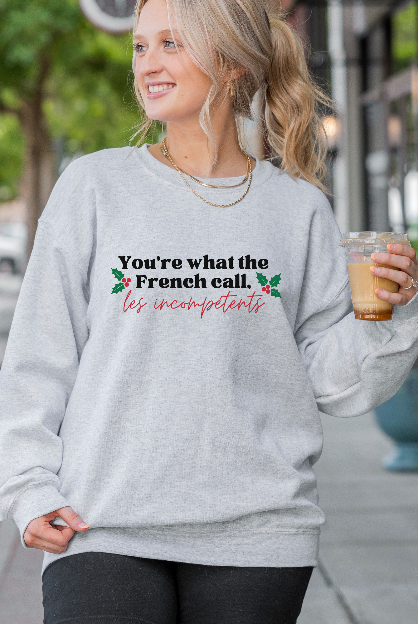 Shop You're What The French Call Les Incompétents Graphic Top | Home Alone Christmas- at Ruby Joy Boutique, a Women's Clothing Store in Pickerington, Ohio