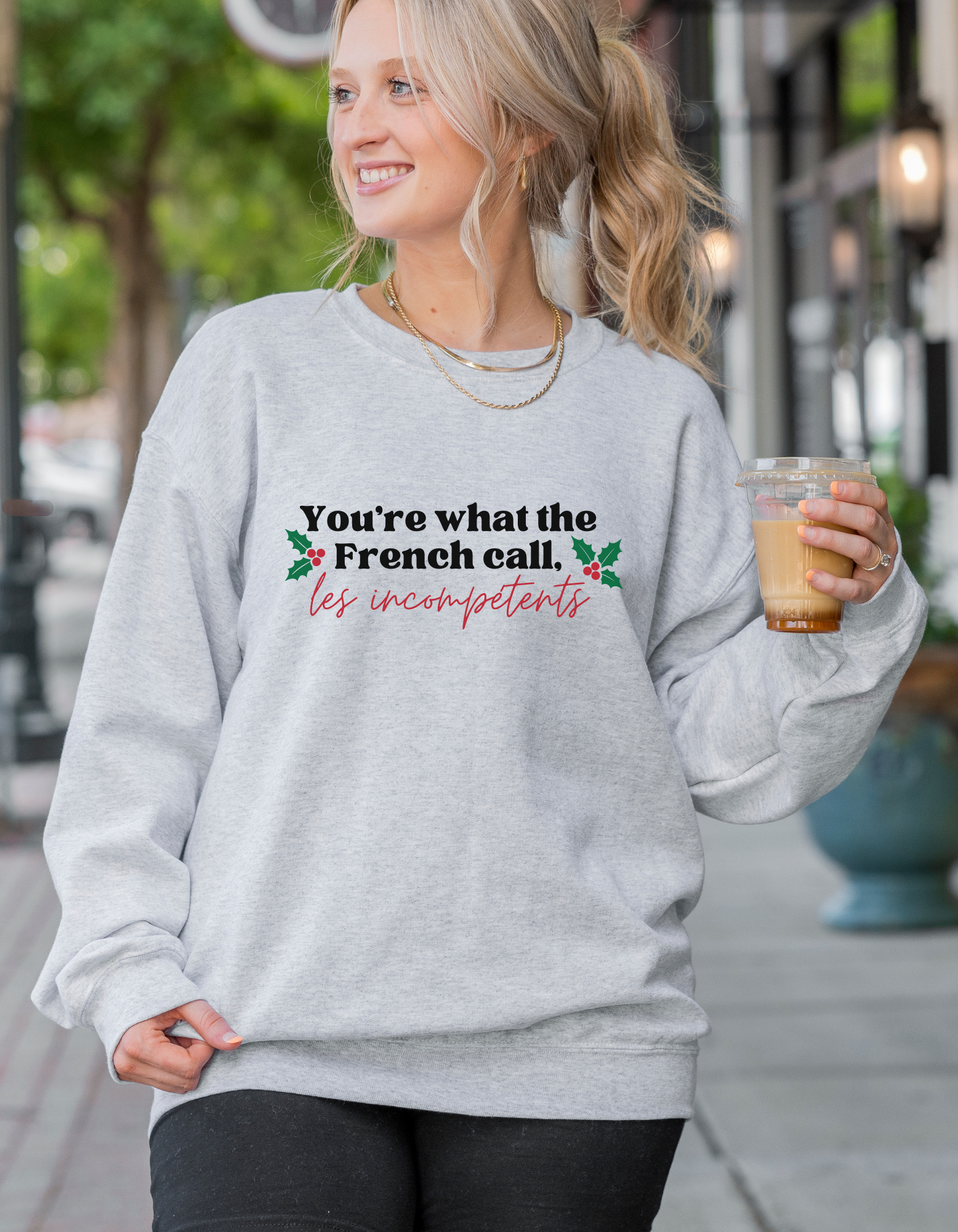 Shop You're What The French Call Les Incompétents Graphic Top | Home Alone Christmas- at Ruby Joy Boutique, a Women's Clothing Store in Pickerington, Ohio